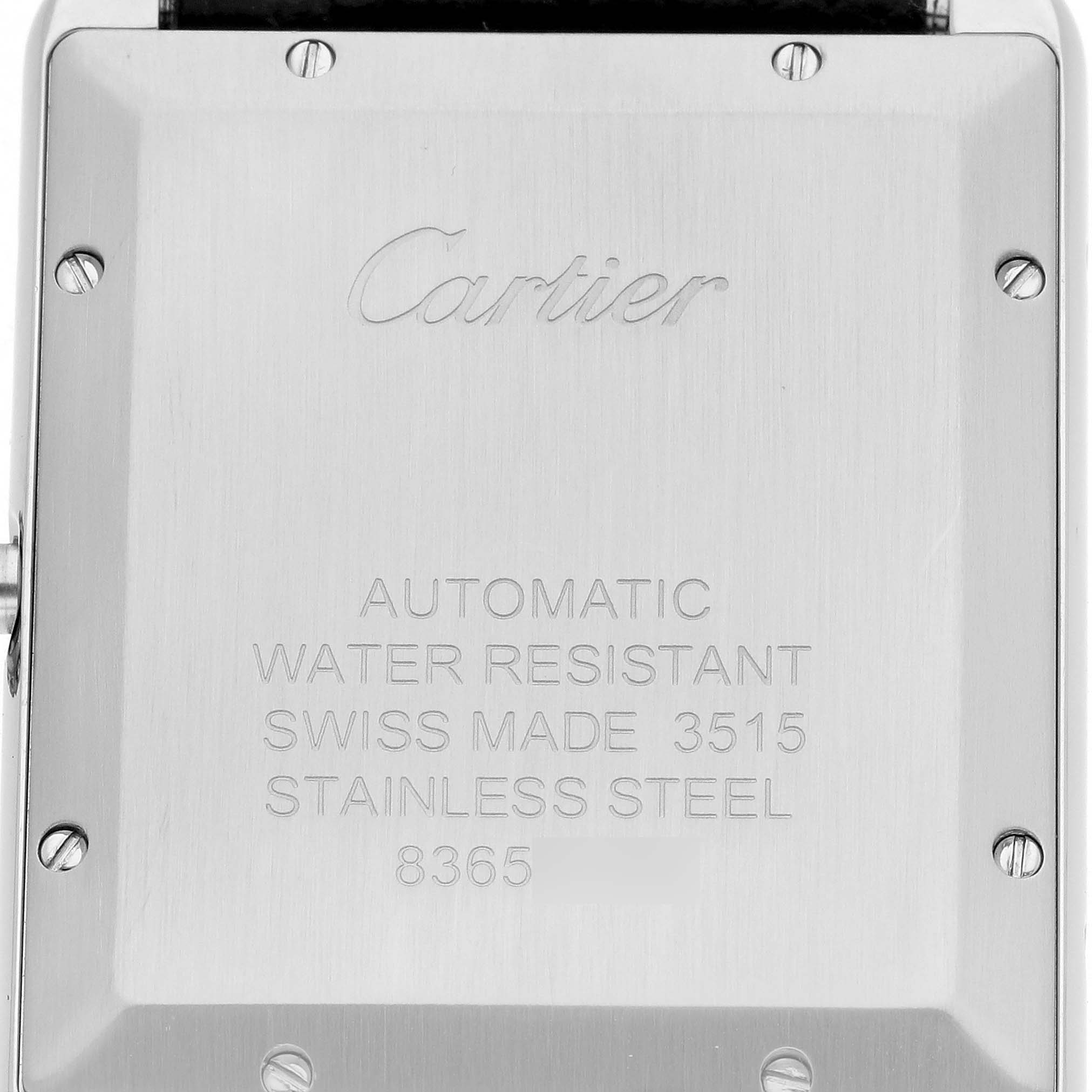 The image shows the back of the Cartier Tank Solo W5200027 Men's Stainless Steel Silver Dial W5200027 Men's Stainless Steel Silver Dial watch, displaying engraving details and screws.