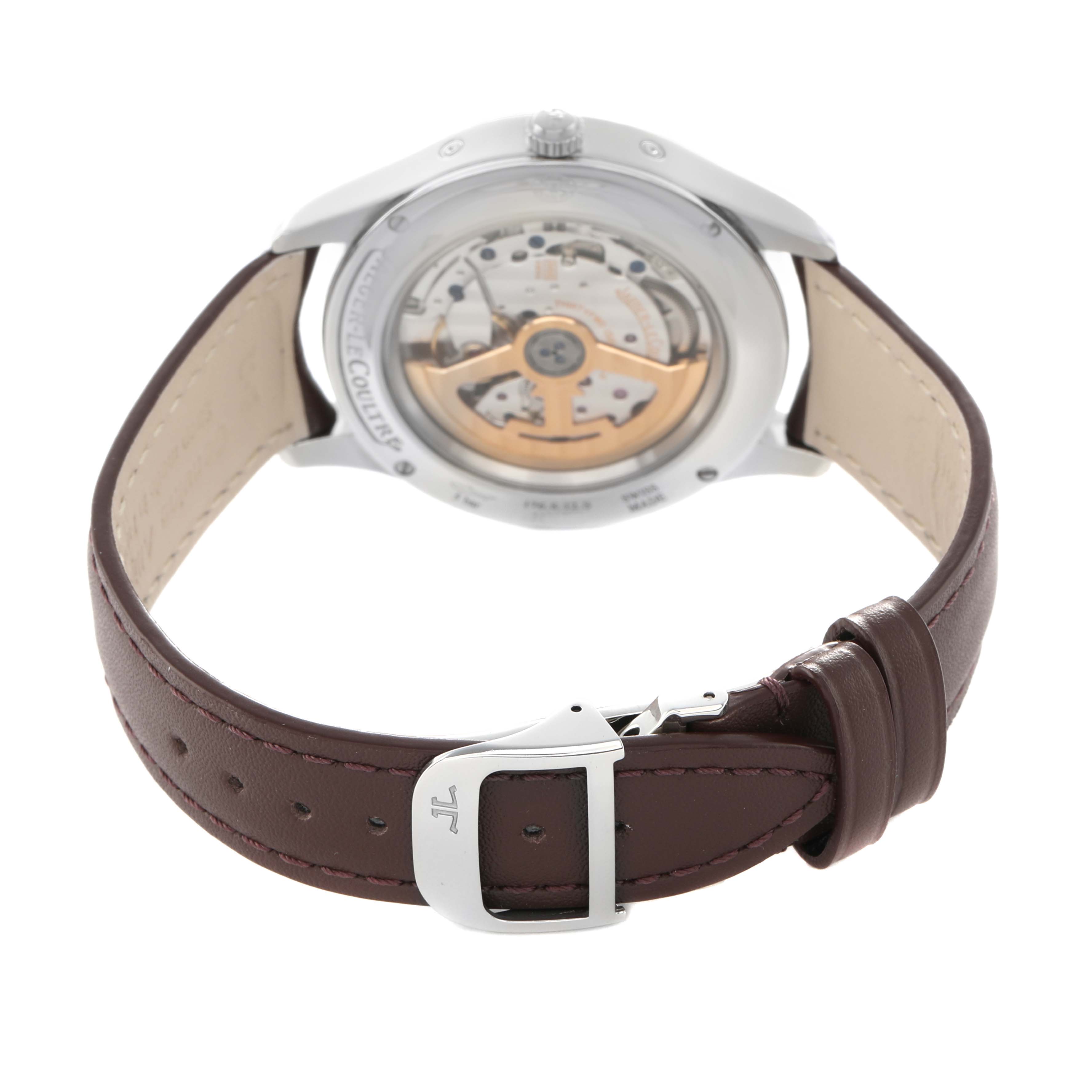 The Jaeger LeCoultre Master Q1558421 Men's Stainless Steel Silver Dial watch is shown from the back, highlighting the automatic movement and leather strap with a clasp.