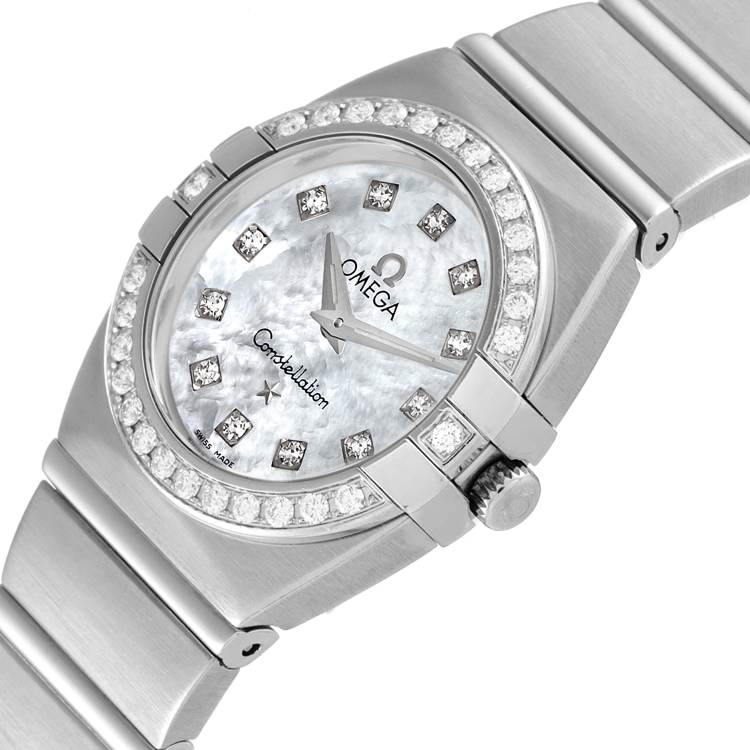 The image shows an angled close-up of the Omega 1589.75.00 Women's Stainless Steel Mother of Pearl Dial 1589.75.00 Women's Stainless Steel Mother of Pearl Dial Constellation MOP Diamond Steel Ladies Watch 1589.75.00, highlighting the face, bezel, and part of the band.