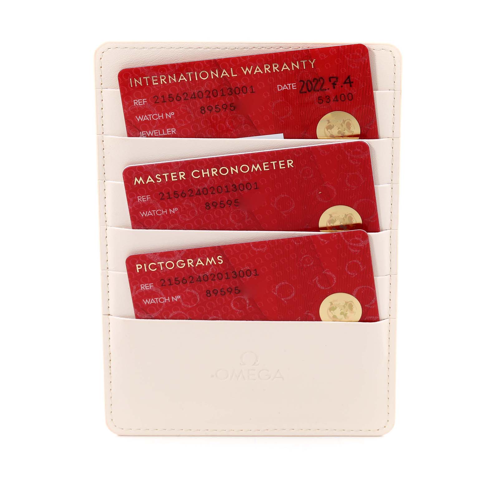 The image shows the warranty cards and documents for an Omega Planet Ocean 215.62.40.20.13.001 Men's Ceramic Brown Dial watch, displayed in a white holder.