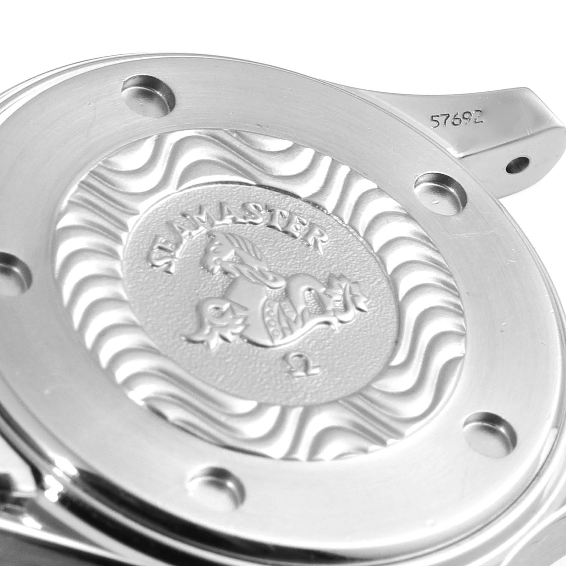 This close-up image shows the stainless steel case back of the Omega 2284.50.00 Women's Stainless Steel Black Dial 2284.50.00 Women's Stainless Steel Black Dial Seamaster Diver 300M 28mm Steel Ladies Watch 2284.50.00.