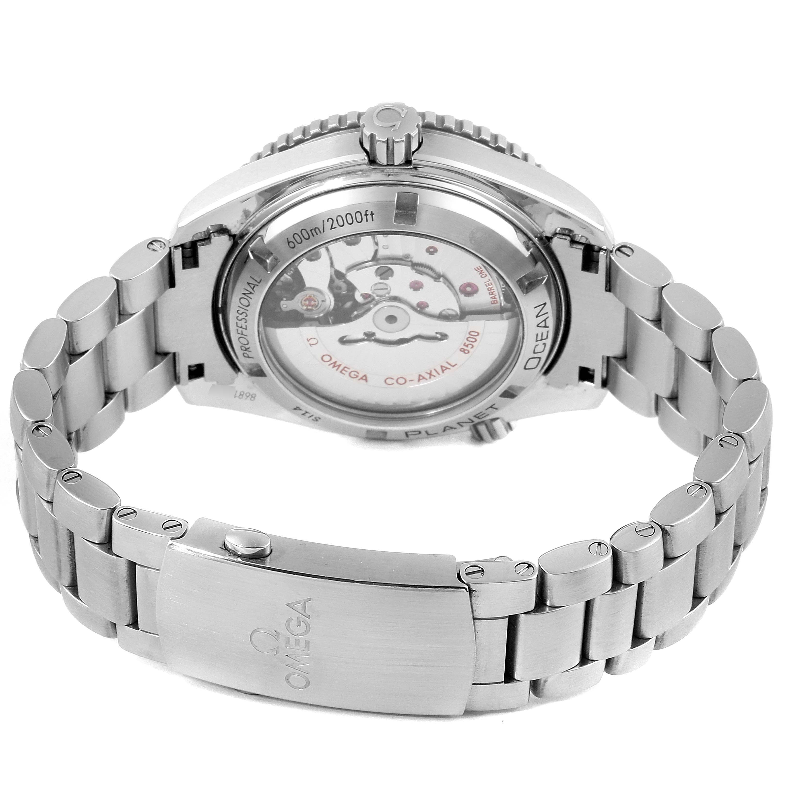 The image shows the Omega Planet Ocean 232.30.42.21.01.003 Men
s Stainless Steel Black Dial 232.30.42.21.01.003 Men
s Stainless Steel Black Dial watch from the back, highlighting its bracelet and transparent case back.