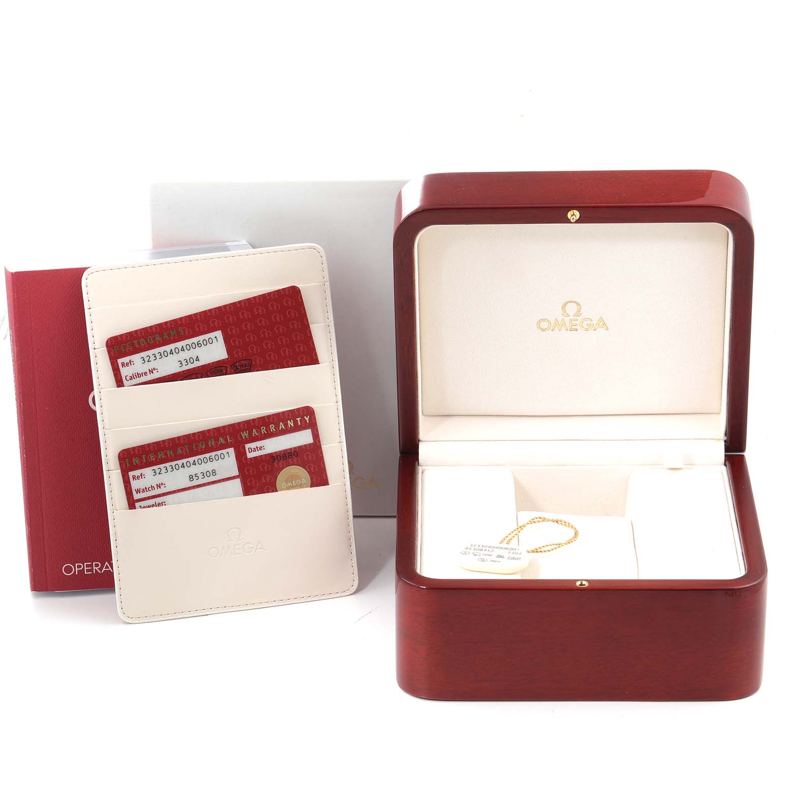 The image shows an open Omega Speedmaster 323.30.40.40.06.001 Men's Stainless Steel Grey Dial 323.30.40.40.06.001 Men's Stainless Steel Grey Dial watch box, warranty cards, and a cardholder from a frontal angle.