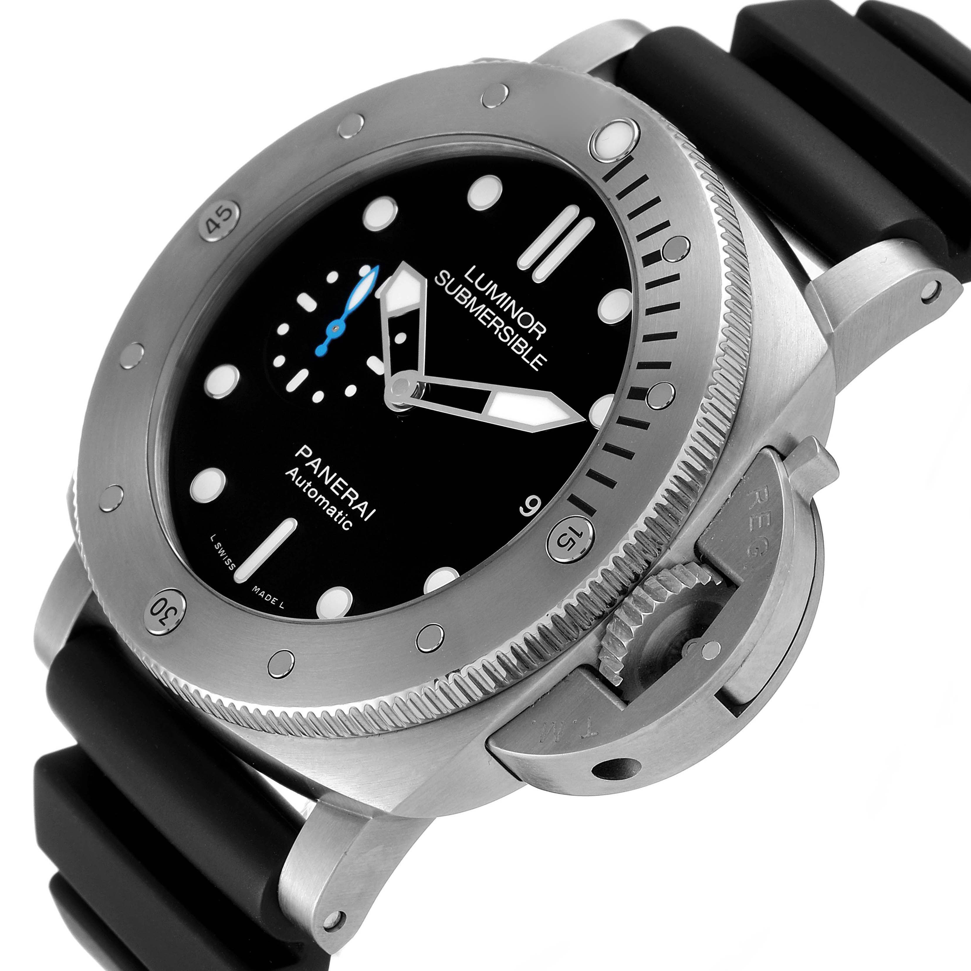 The Panerai Luminor Submersible watch is shown at an angled view, highlighting the bezel, dial, and black rubber strap.