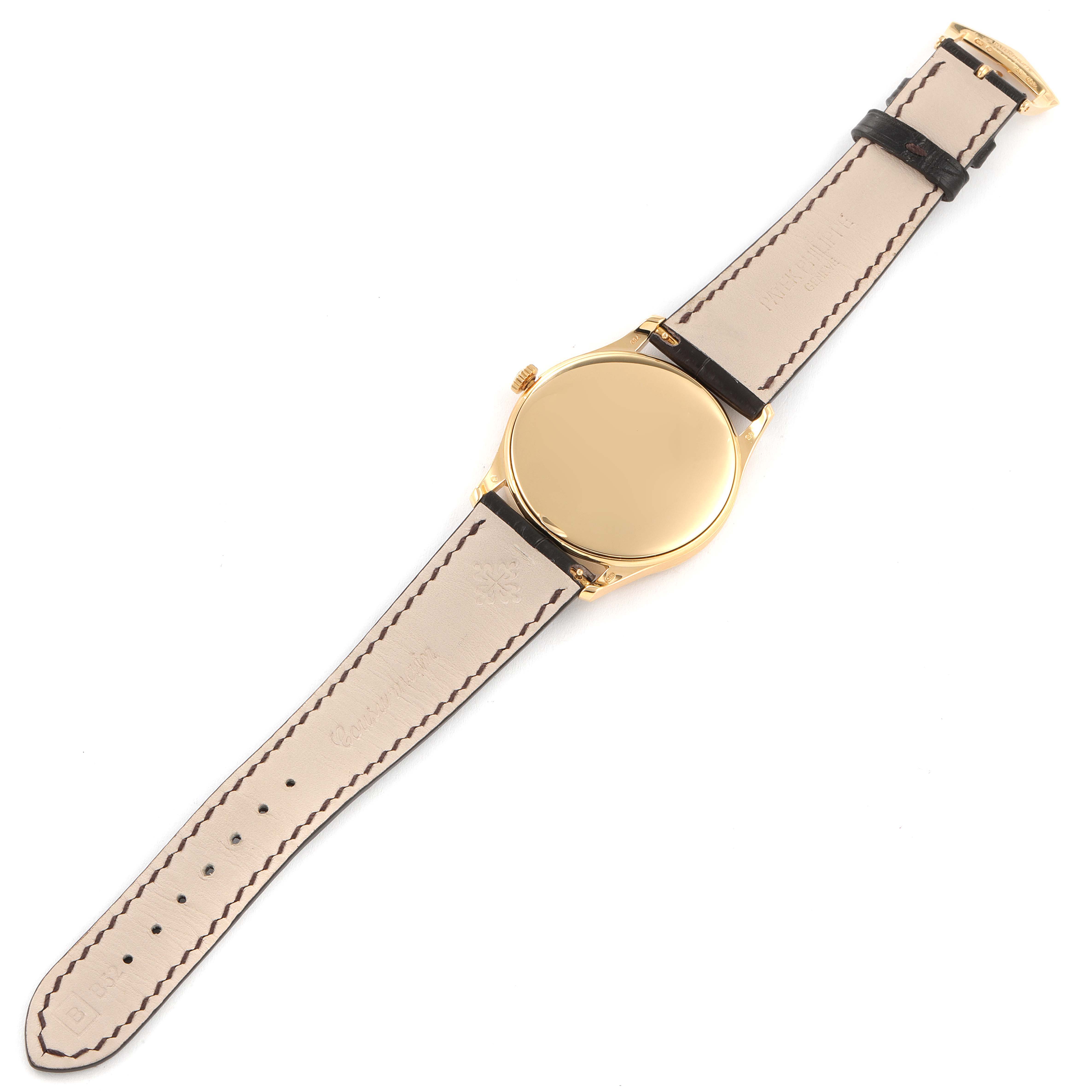 This image shows the back and strap of a Patek Philippe Calatrava 5196J Men's Yellow Gold Silver Dial 5196J Men's Yellow Gold Silver Dial watch, viewed from the underside.