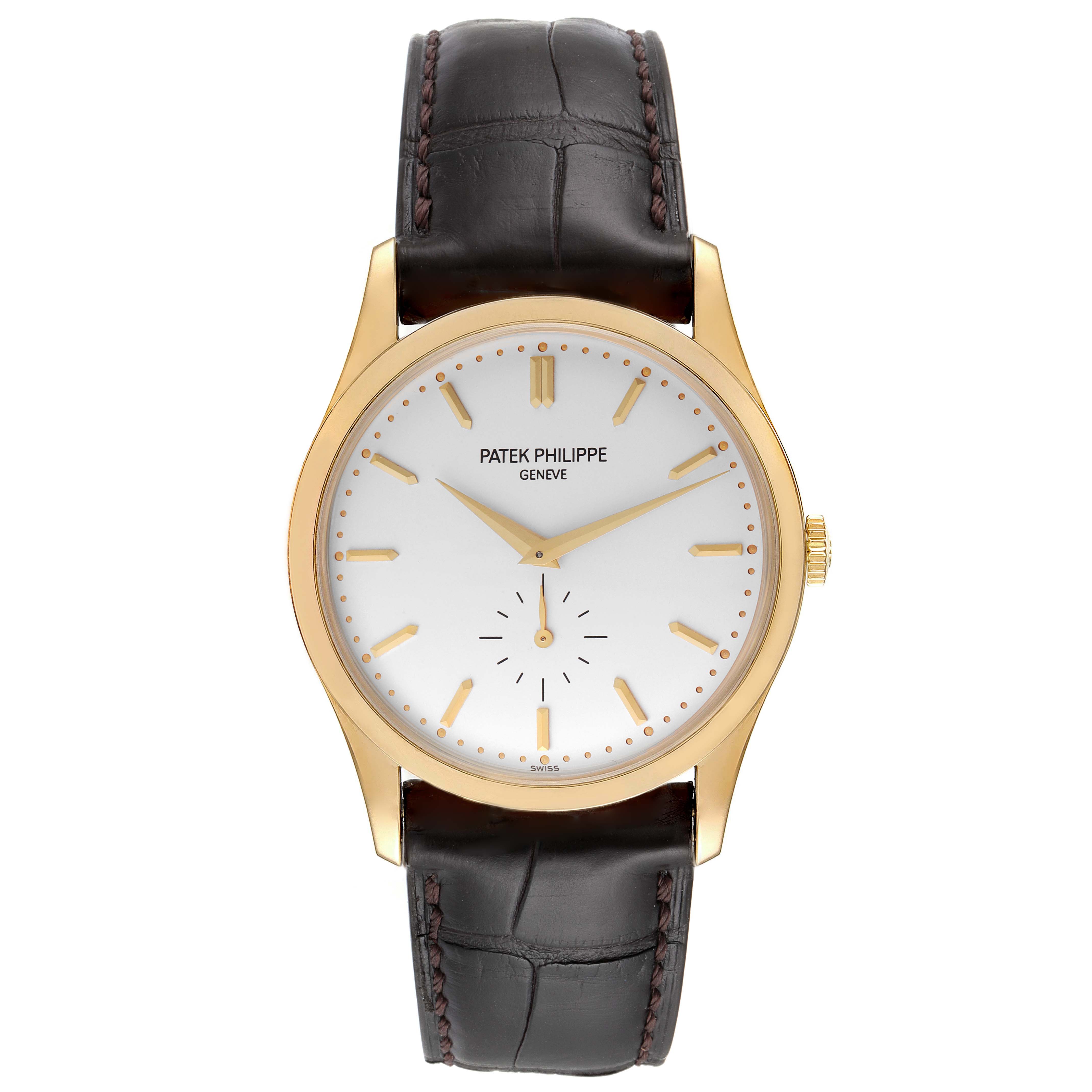 The image shows a front view of a Patek Philippe Calatrava 5196J Men's Yellow Gold Silver Dial 5196J Men's Yellow Gold Silver Dial watch featuring a gold case and a black leather strap.