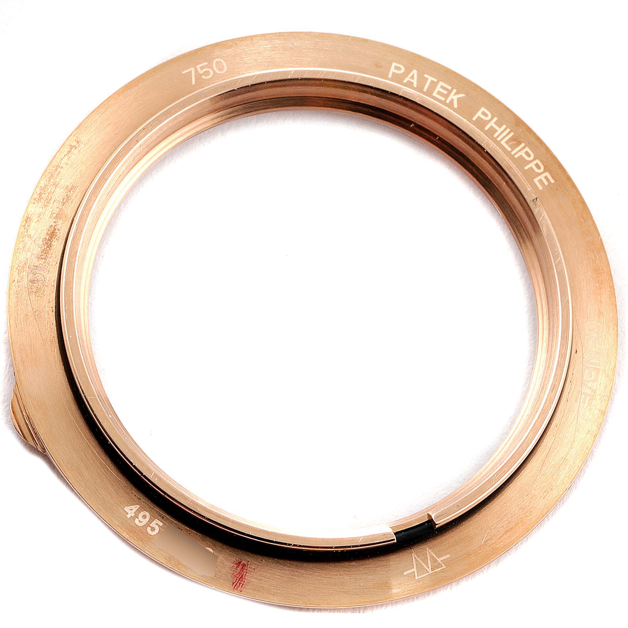 This image shows a top-down view of the bezel from a Patek Philippe Calatrava 5119R Men's Rose Gold White Dial 5119R Men's Rose Gold White Dial watch.