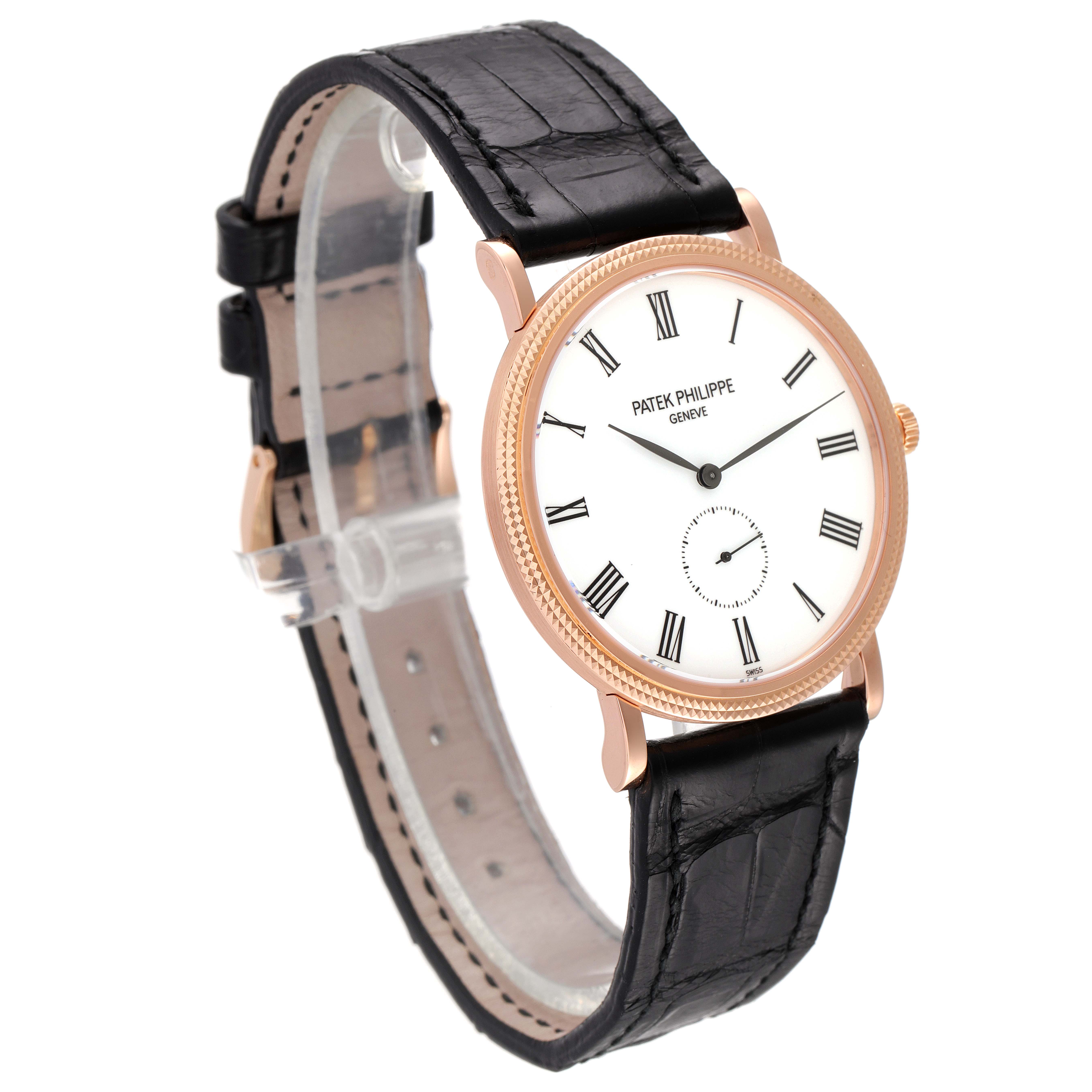 The Patek Philippe Calatrava 5119R Men's Rose Gold White Dial 5119R Men's Rose Gold White Dial watch is shown at a slight angle, displaying its face, strap, and case.