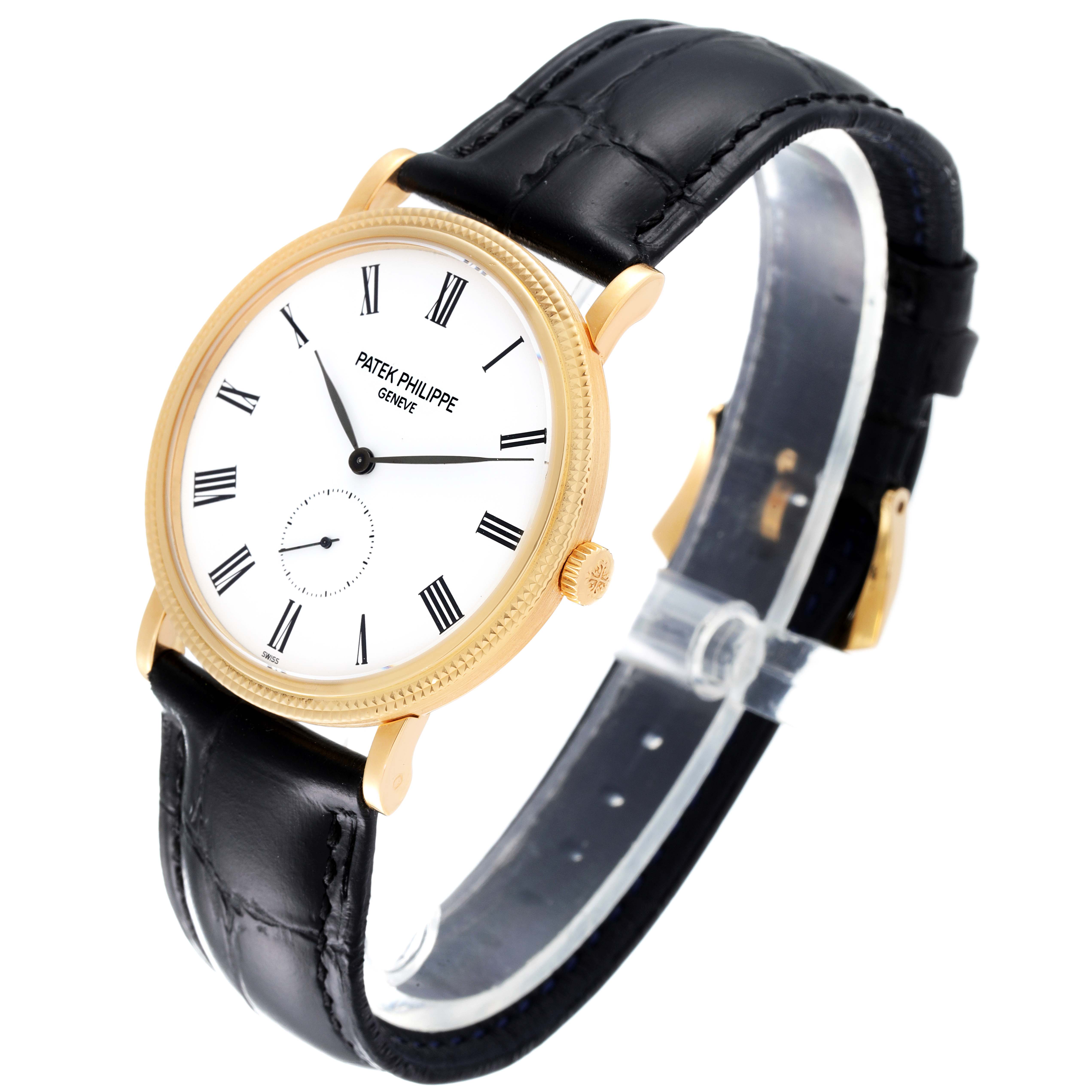 This image shows a side angle of the Patek Philippe Calatrava 5119J Men's Yellow Gold White Dial 5119J Men's Yellow Gold White Dial watch, featuring its face, bezel, crown, and black leather strap.