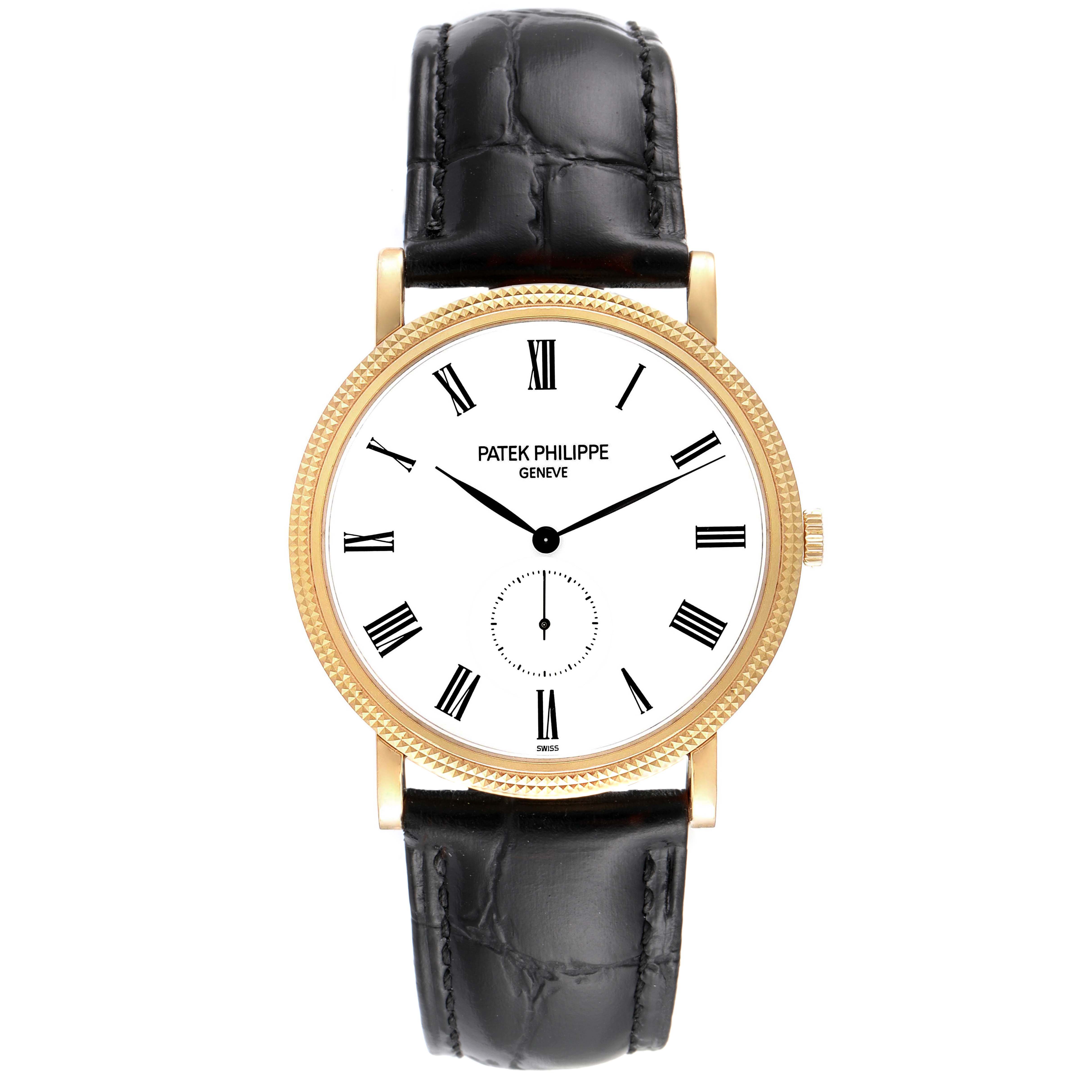This is a front view of the Patek Philippe Calatrava 5119J Men's Yellow Gold White Dial 5119J Men's Yellow Gold White Dial watch, showing the face, bezel, and leather strap.