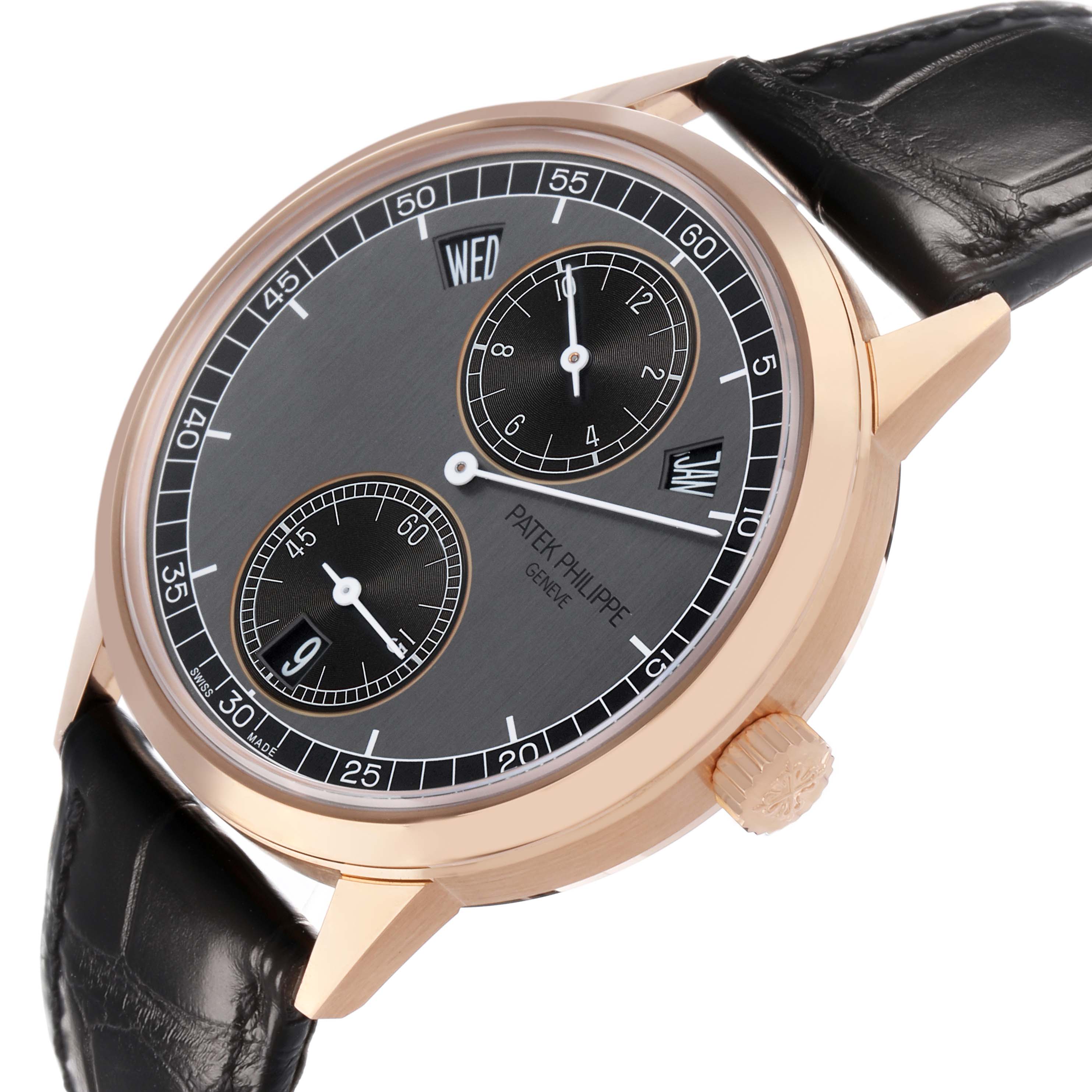 The Patek Philippe Complications 5235/50R-001 Men's Rose Gold Grey Dial watch is shown at an angled view, highlighting the dial, subdials, bezel, and leather strap.