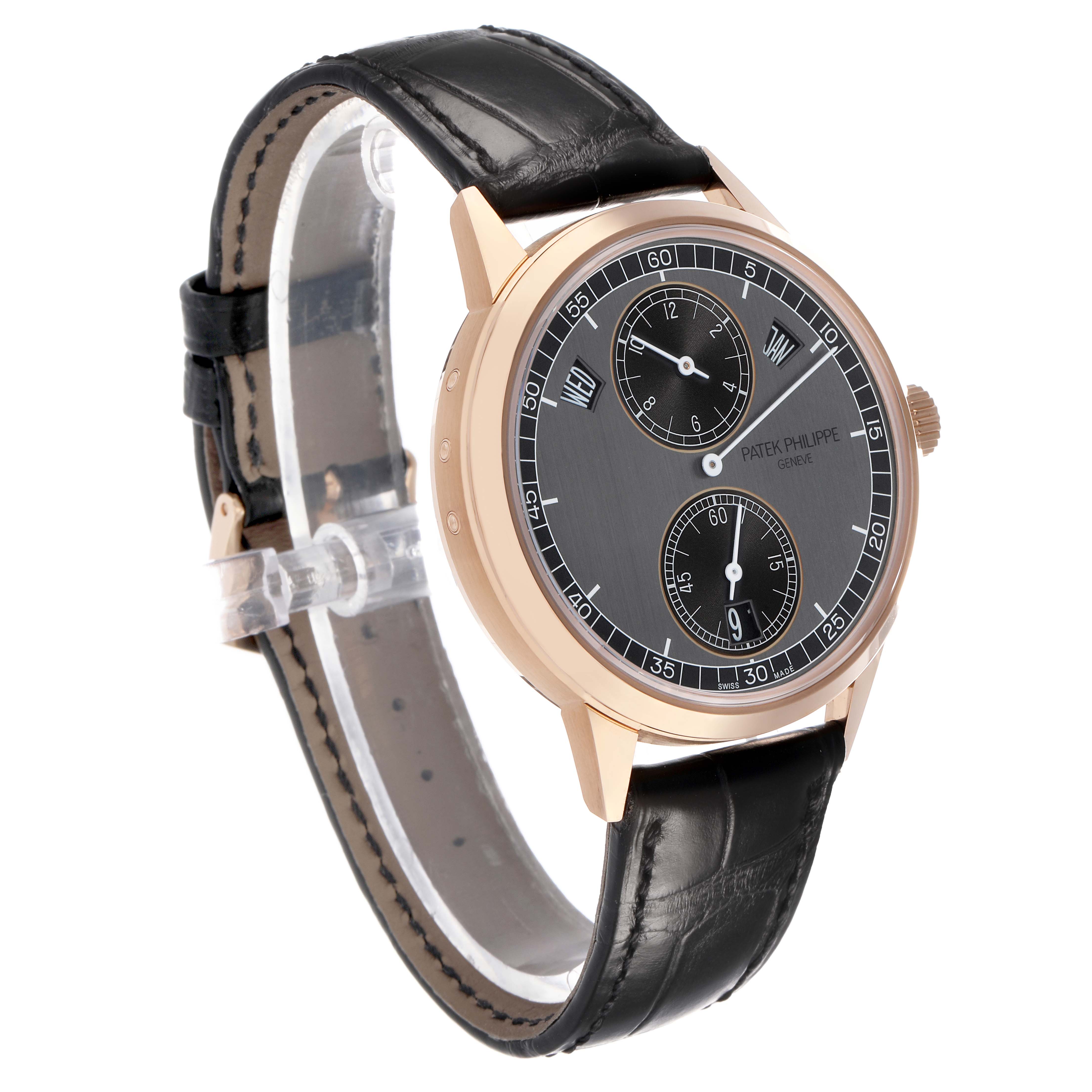 The Patek Philippe Complications 5235/50R-001 Men's Rose Gold Grey Dial watch is shown at a three-quarter angle, displaying the dial, case, crown, and leather strap.