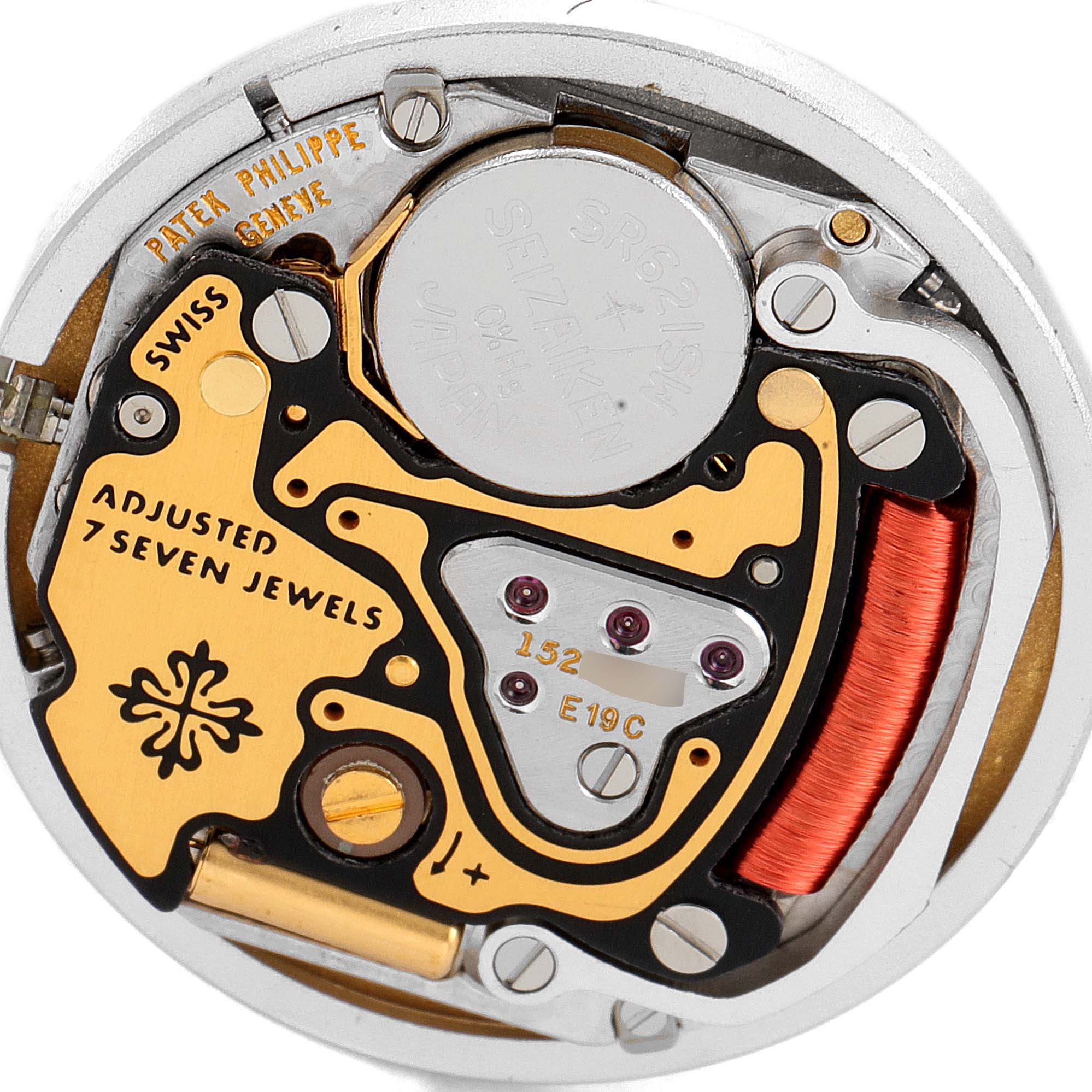 This close-up photo shows the intricate inner mechanism and components of the Patek Philippe Nautilus 4700/153 Women's Yellow Gold Champagne Dial 4700/153 Women's Yellow Gold Champagne Dial watch.