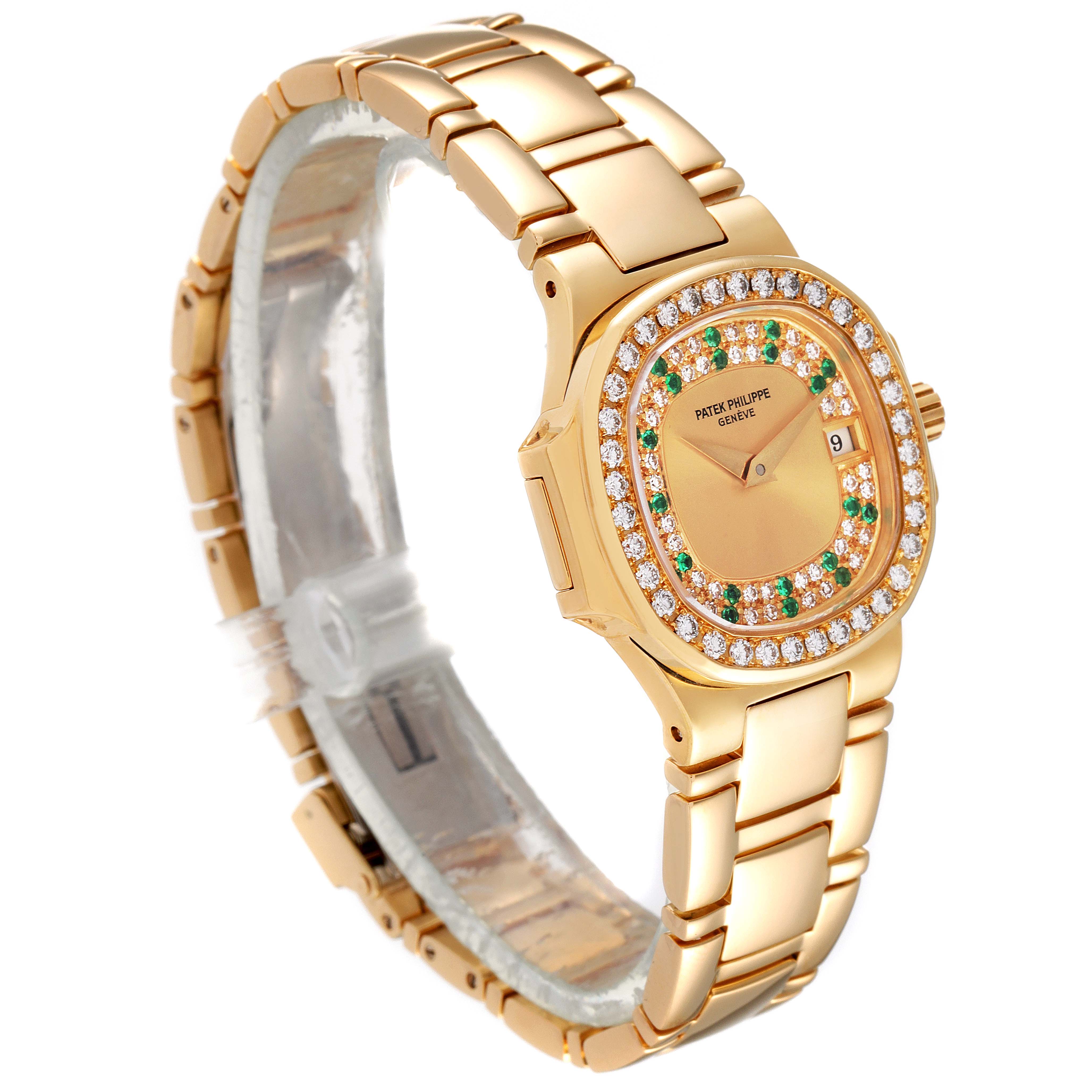 The image shows a Patek Philippe Nautilus 4700/153 Women's Yellow Gold Champagne Dial 4700/153 Women's Yellow Gold Champagne Dial model watch at a front-side angle, displaying its face, bezel, and bracelet.