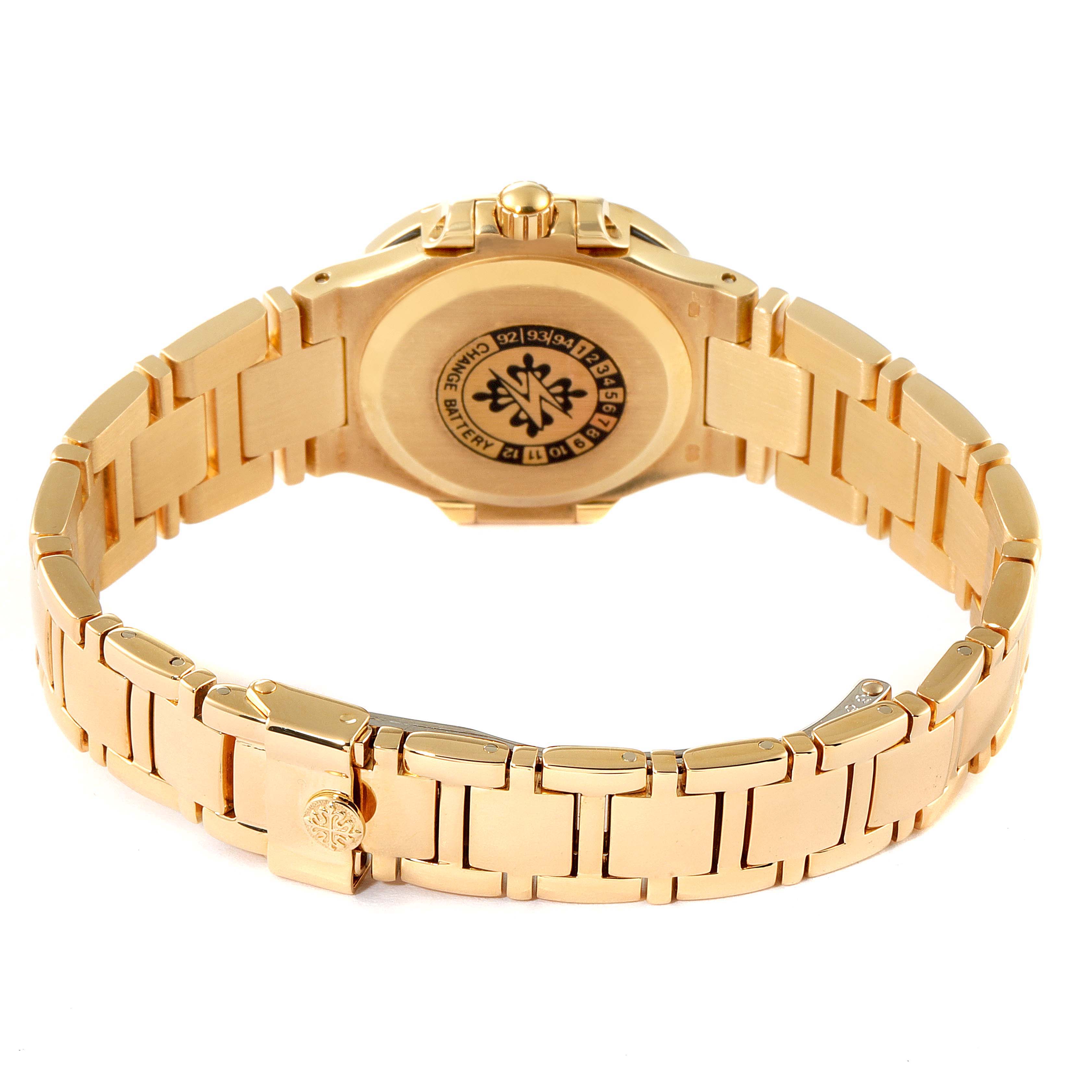 This image shows the backside and bracelet of a gold Patek Philippe Nautilus 4700/153 Women's Yellow Gold Champagne Dial 4700/153 Women's Yellow Gold Champagne Dial watch.