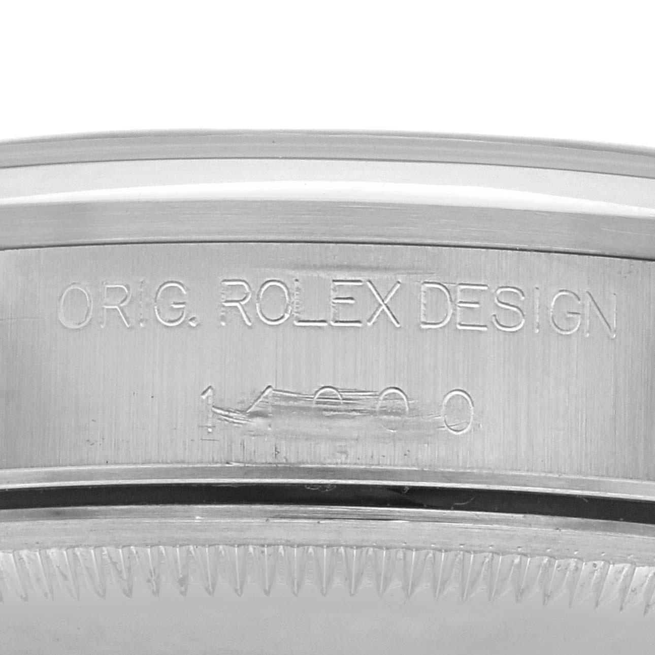 This image shows the side view of the Rolex Air-King 14000 Men's Stainless Steel Blue Dial 14000 Men's Stainless Steel Blue Dial watch case with the engraving "ORIG ROLEX DESIGN."