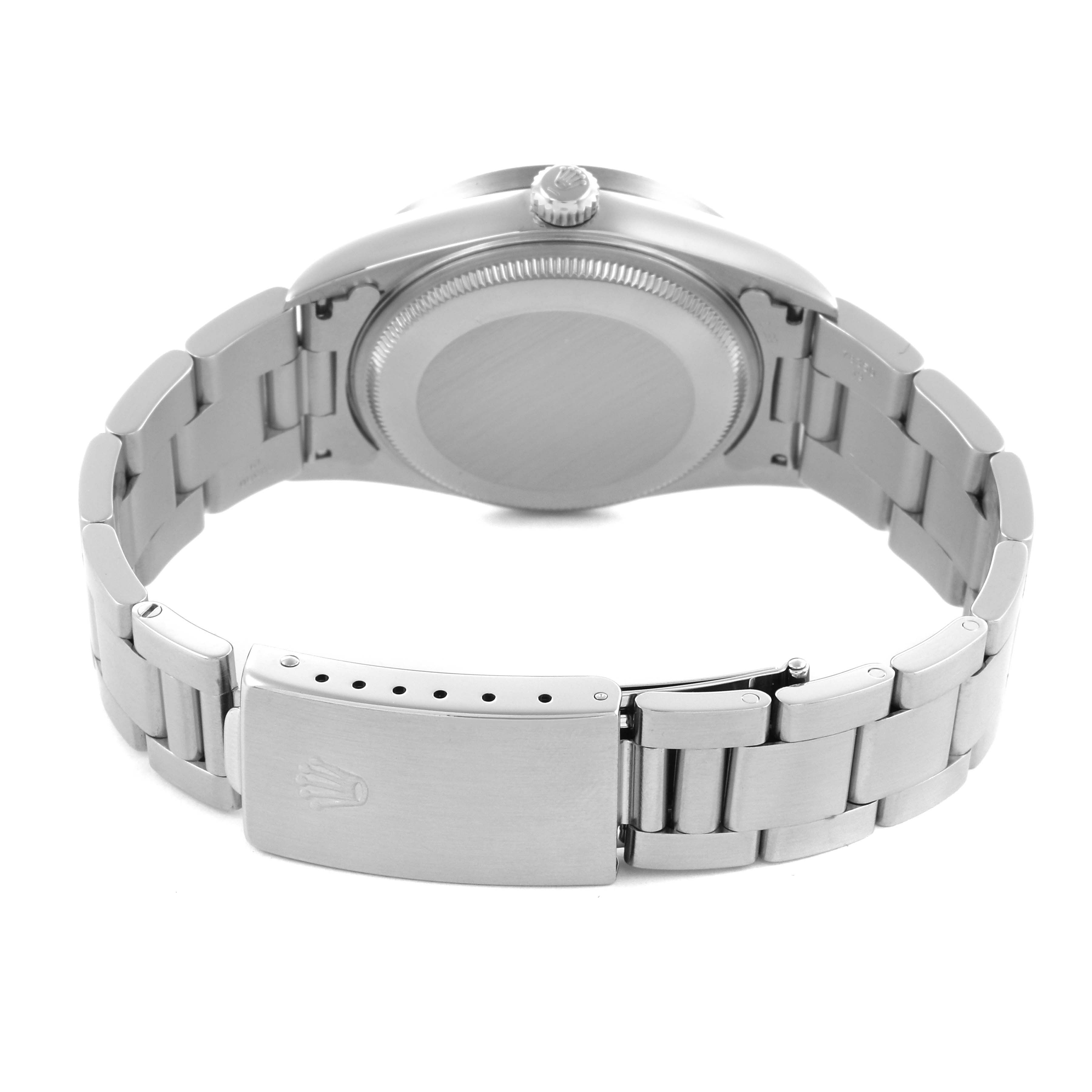 The image shows the back of a Rolex Air-King 14010 Men's Stainless Steel White Dial 14010 Men's Stainless Steel White Dial watch, highlighting the case back, crown, and bracelet clasp.