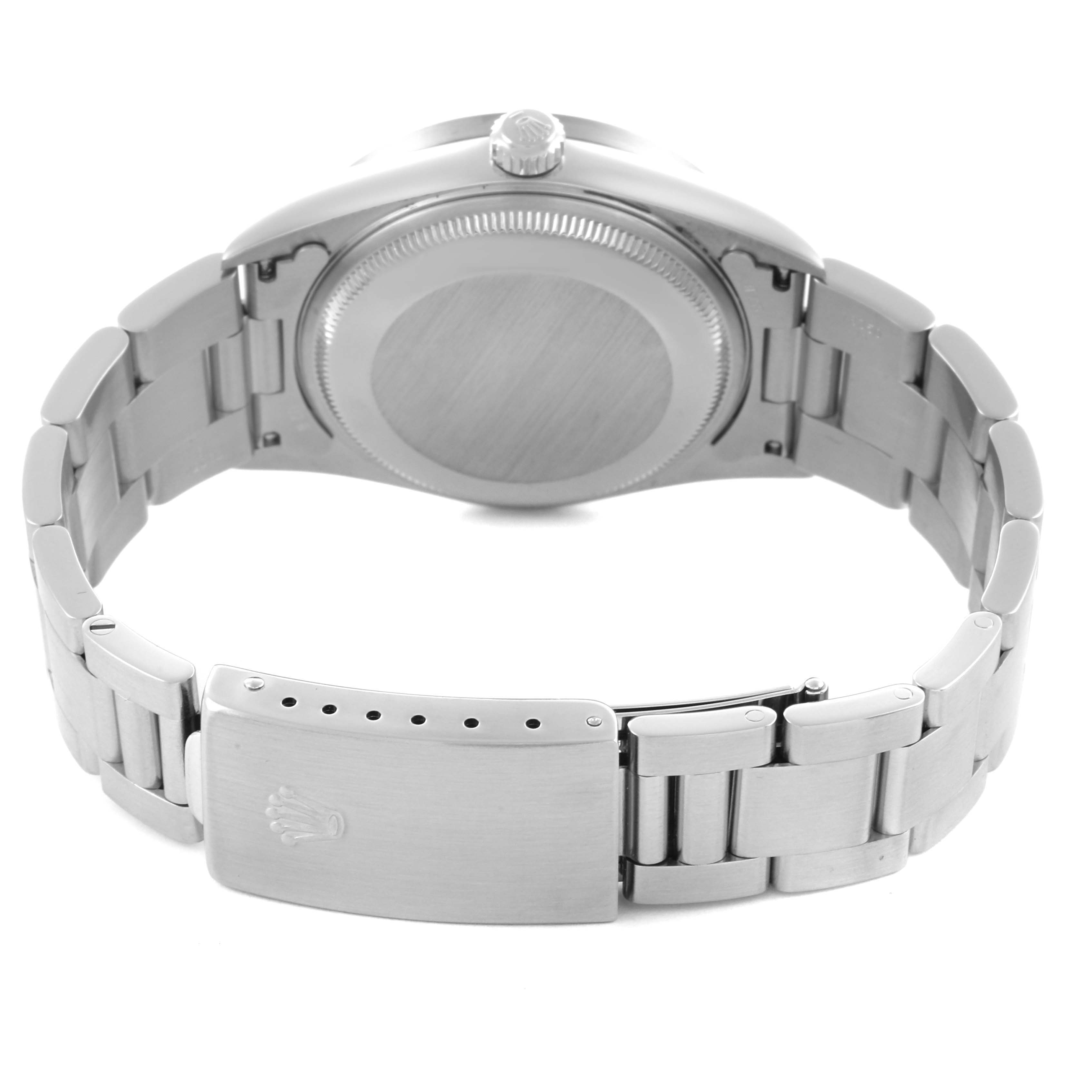 The Rolex Air-King 14010 Men's Stainless Steel Black Dial 14010 Men's Stainless Steel Black Dial watch is shown from the back, highlighting its case back, bracelet, and clasp.