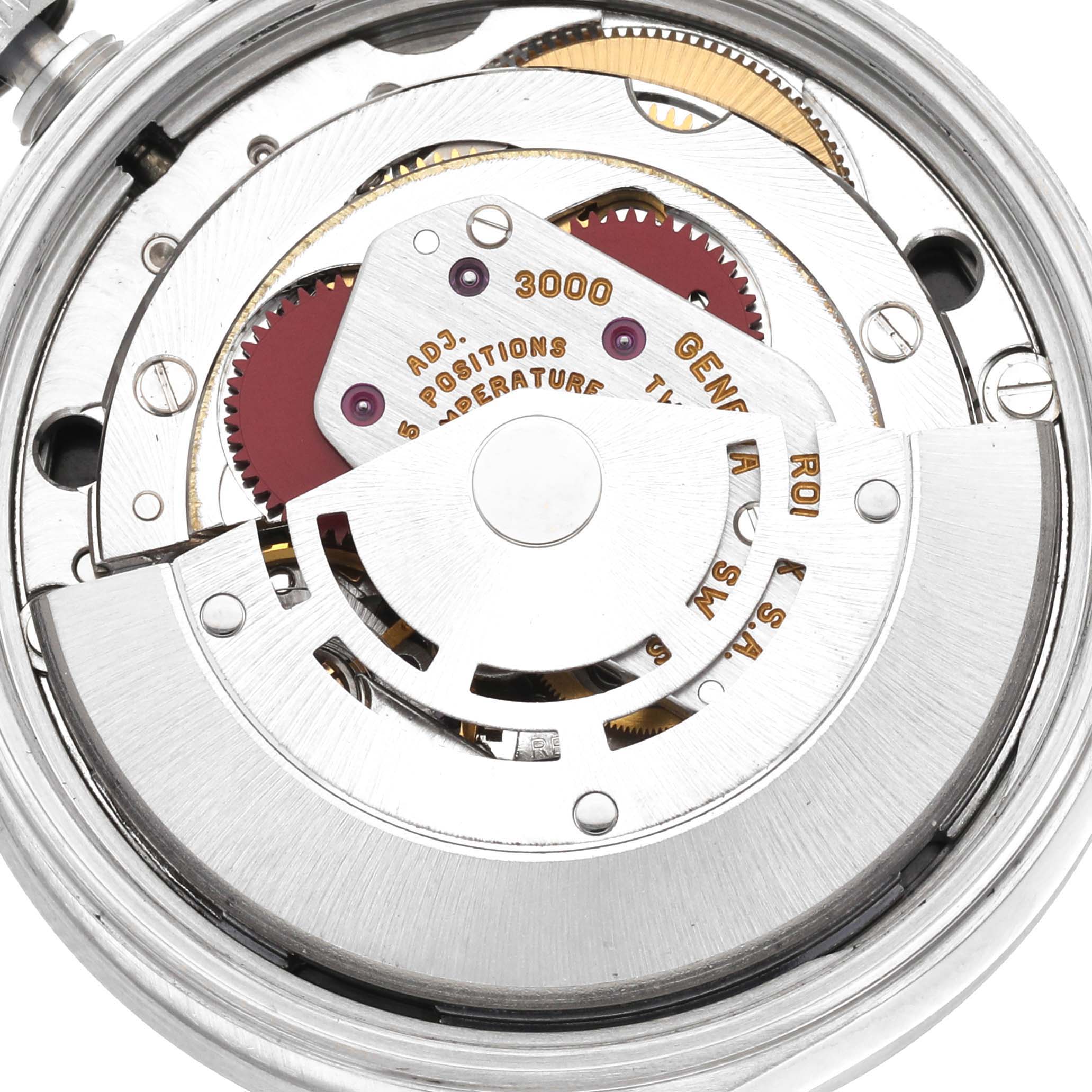 This image shows the inner movement mechanism of a Rolex Air-King 14010 Men's Stainless Steel Black Dial 14010 Men's Stainless Steel Black Dial watch, highlighting gears and components.