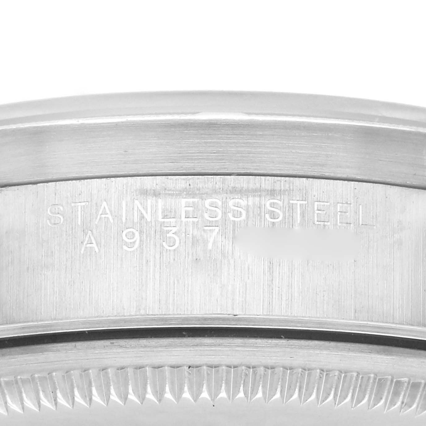 The image shows a close-up side view of the Rolex Air-King 14010 Men's Stainless Steel Black Dial 14010 Men's Stainless Steel Black Dial, highlighting the stainless steel engraving on the case.