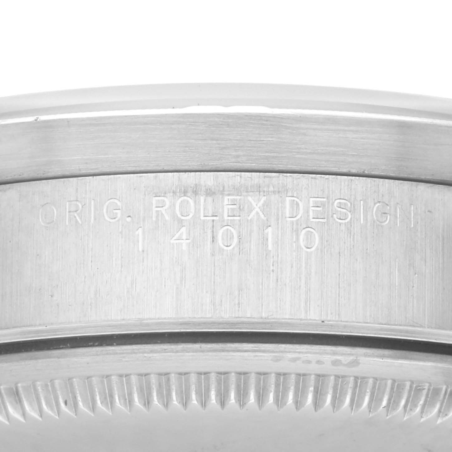 The image shows a close-up side view of the Rolex Air-King 14010 Men's Stainless Steel Black Dial 14010 Men's Stainless Steel Black Dial model's watch case, with engraved text and part of the bezel visible.