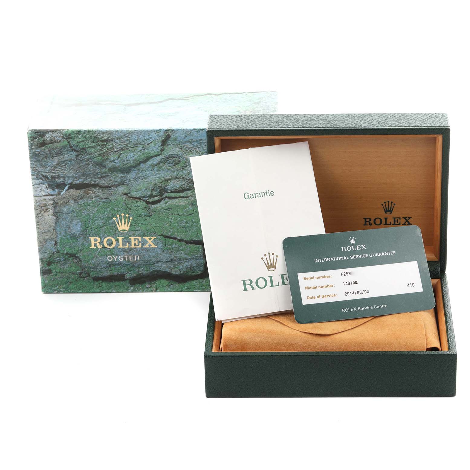 The Rolex Air-King 14010M Men's Stainless Steel Black Dial 14010M Men's Stainless Steel Black Dial accessories are shown with a box, guarantee card, service documents, and packaging at a frontal angle.
