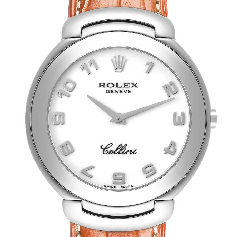 The Rolex Cellini watch is shown from a front angle, highlighting the dial, bezel, case, and part of the strap.