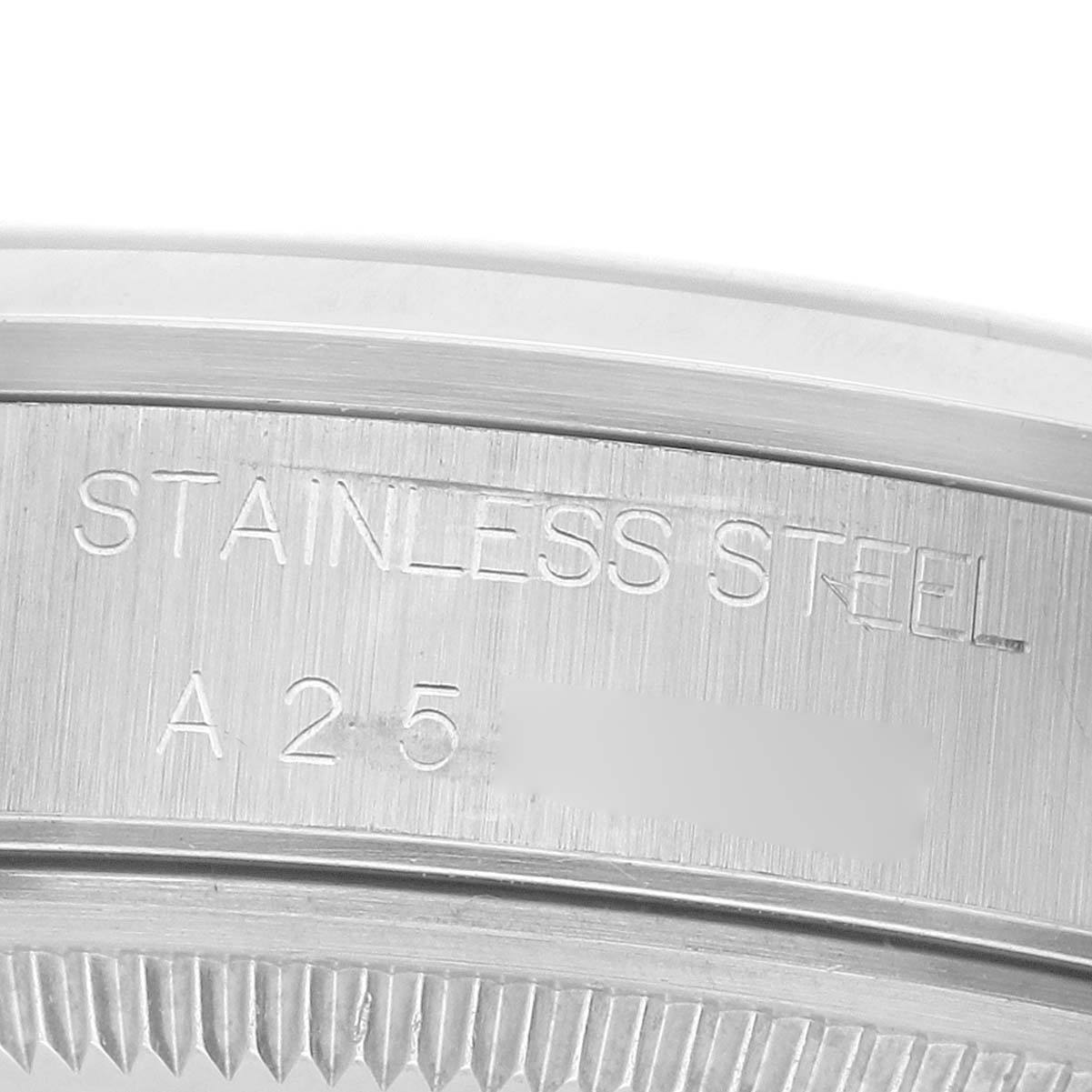 The image shows a close-up of the stainless steel case and bezel of a Rolex Date 15200 Men's Stainless Steel Black Dial model watch.