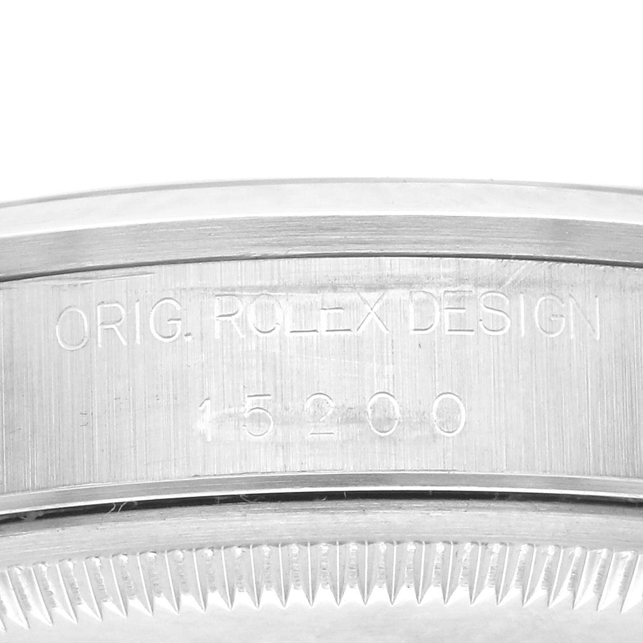 The image shows a close-up of the side case engraving on the Rolex Date 15200 Men's Stainless Steel White Dial 15200 Men's Stainless Steel White Dial model.