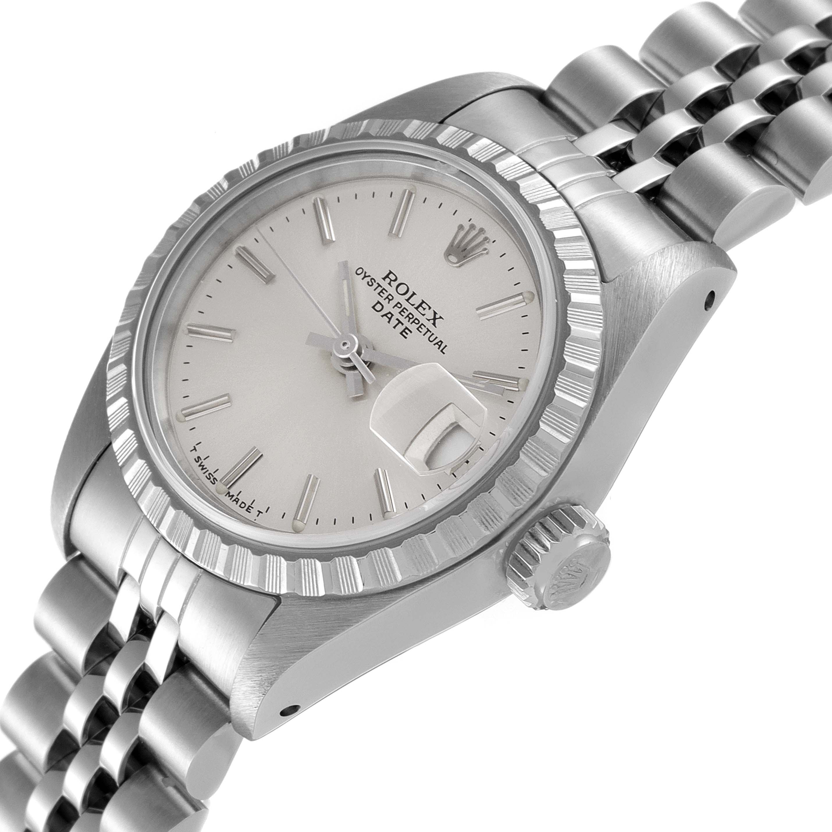The image shows a Rolex Date 69240 Women's Stainless Steel Silver Dial 69240 Women's Stainless Steel Silver Dial model watch at an angled view, highlighting the face, bezel, crown, and part of the bracelet.