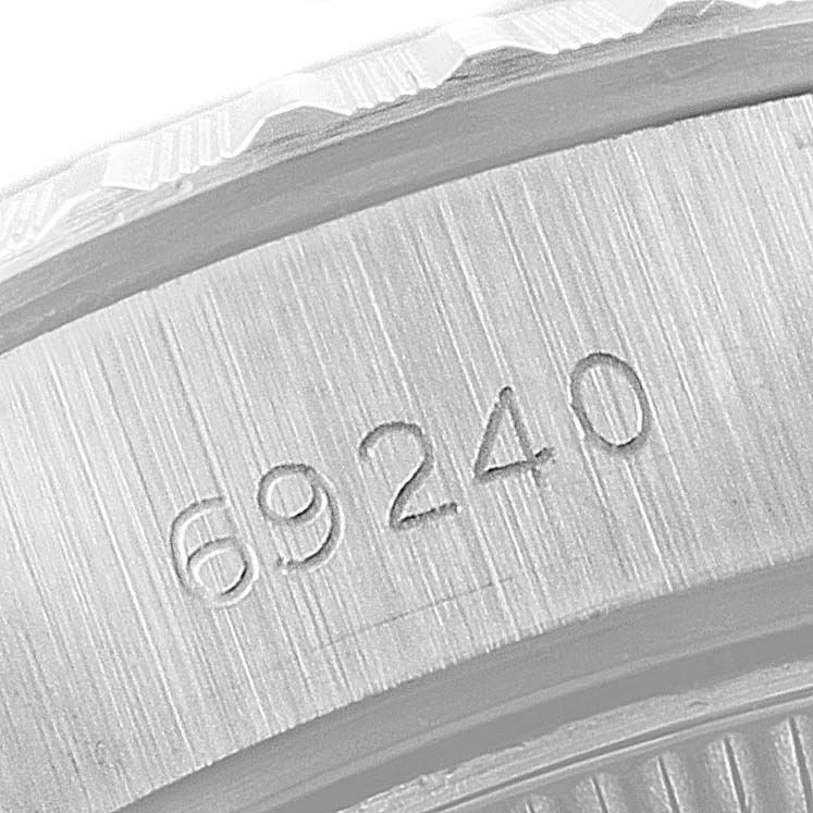 The image shows a close-up view of the model number engraving "69240" on the case of a Rolex Date 69240 Women's Stainless Steel Silver Dial 69240 Women's Stainless Steel Silver Dial watch.