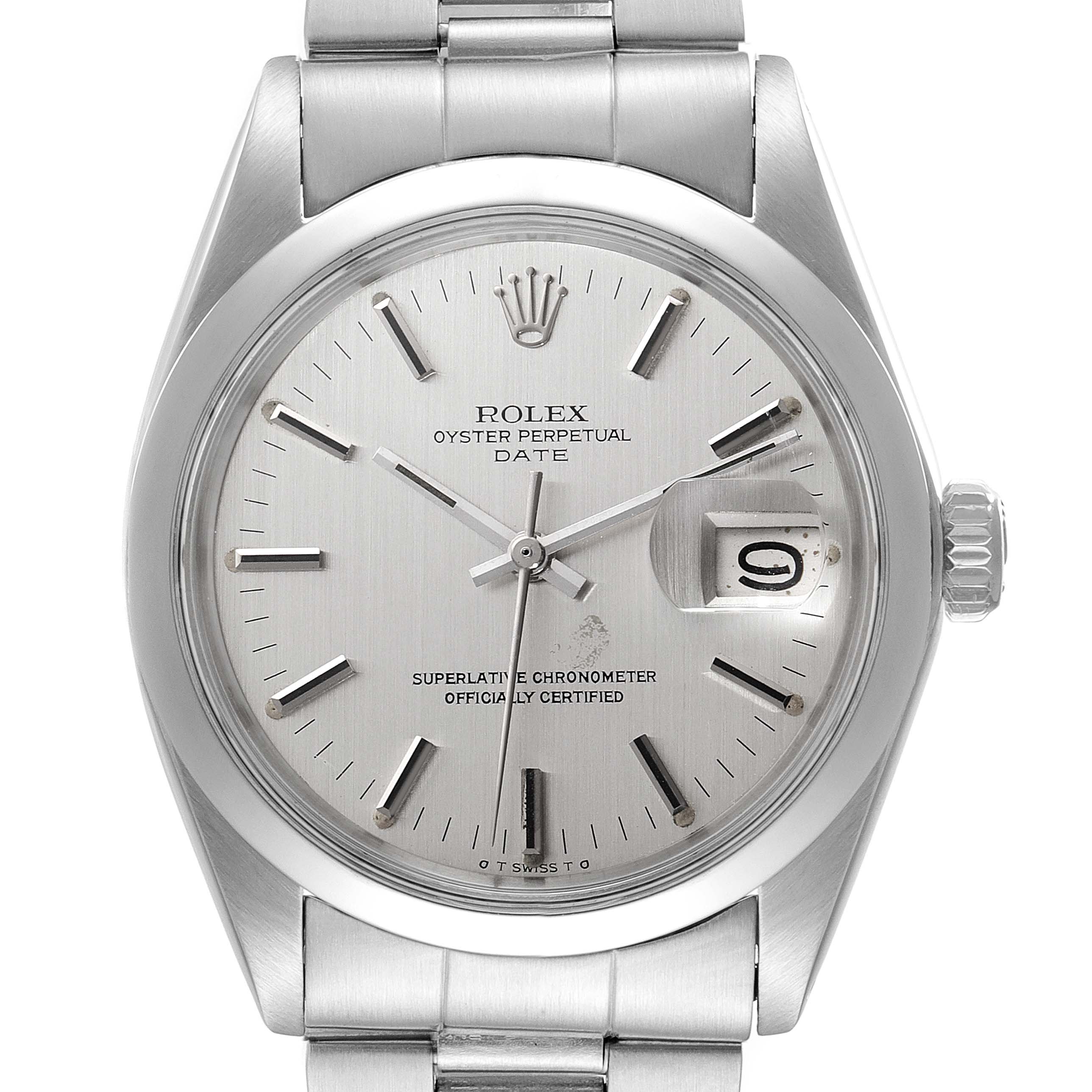 The image shows a close-up, front-facing angle of the Rolex Oyster Perpetual Date watch, highlighting the dial and bracelet.