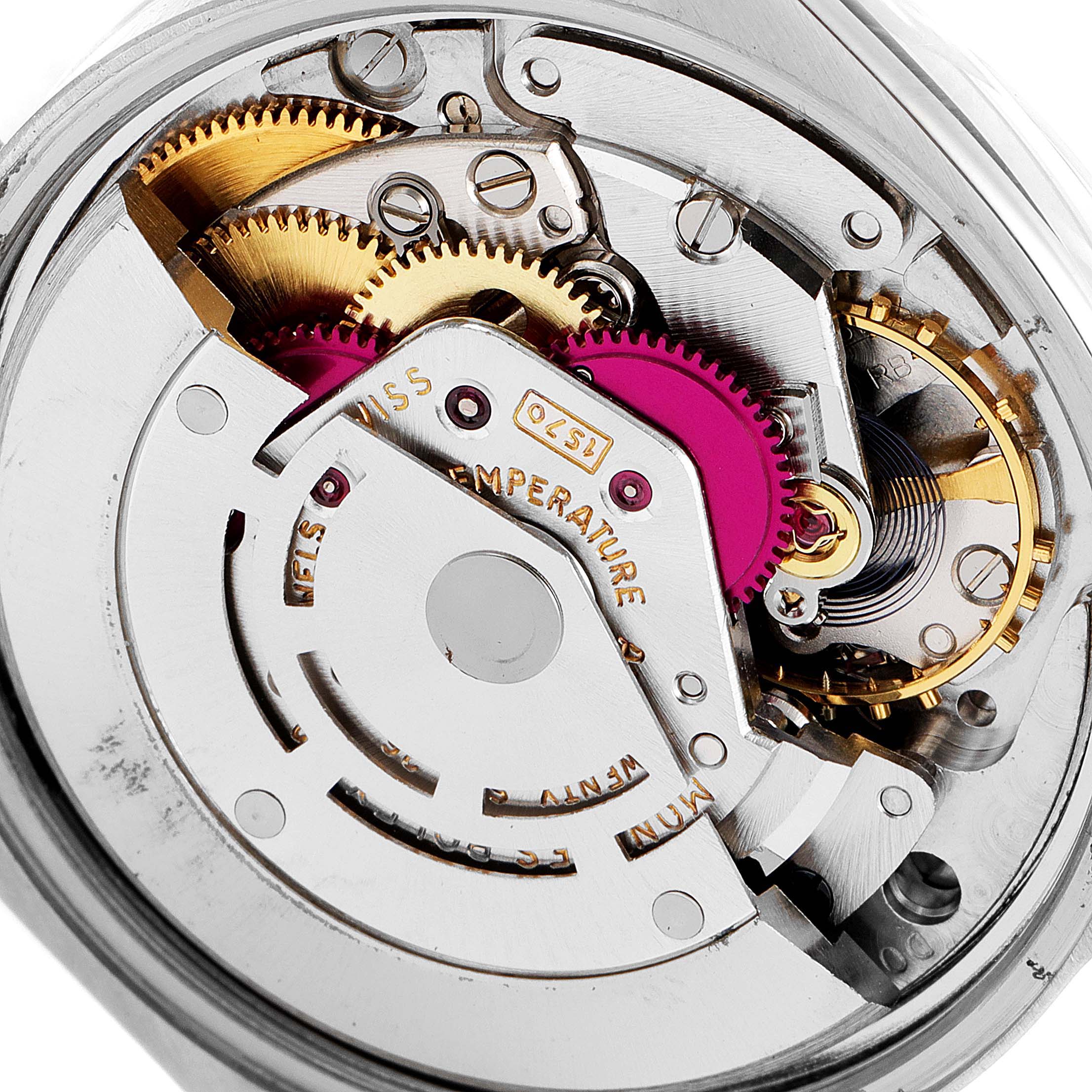 This image shows the detailed internal movement and gears of a Rolex Date 1500 Men's Stainless Steel Silver Dial 1500 Men's Stainless Steel Silver Dial model watch from a direct top-down angle.