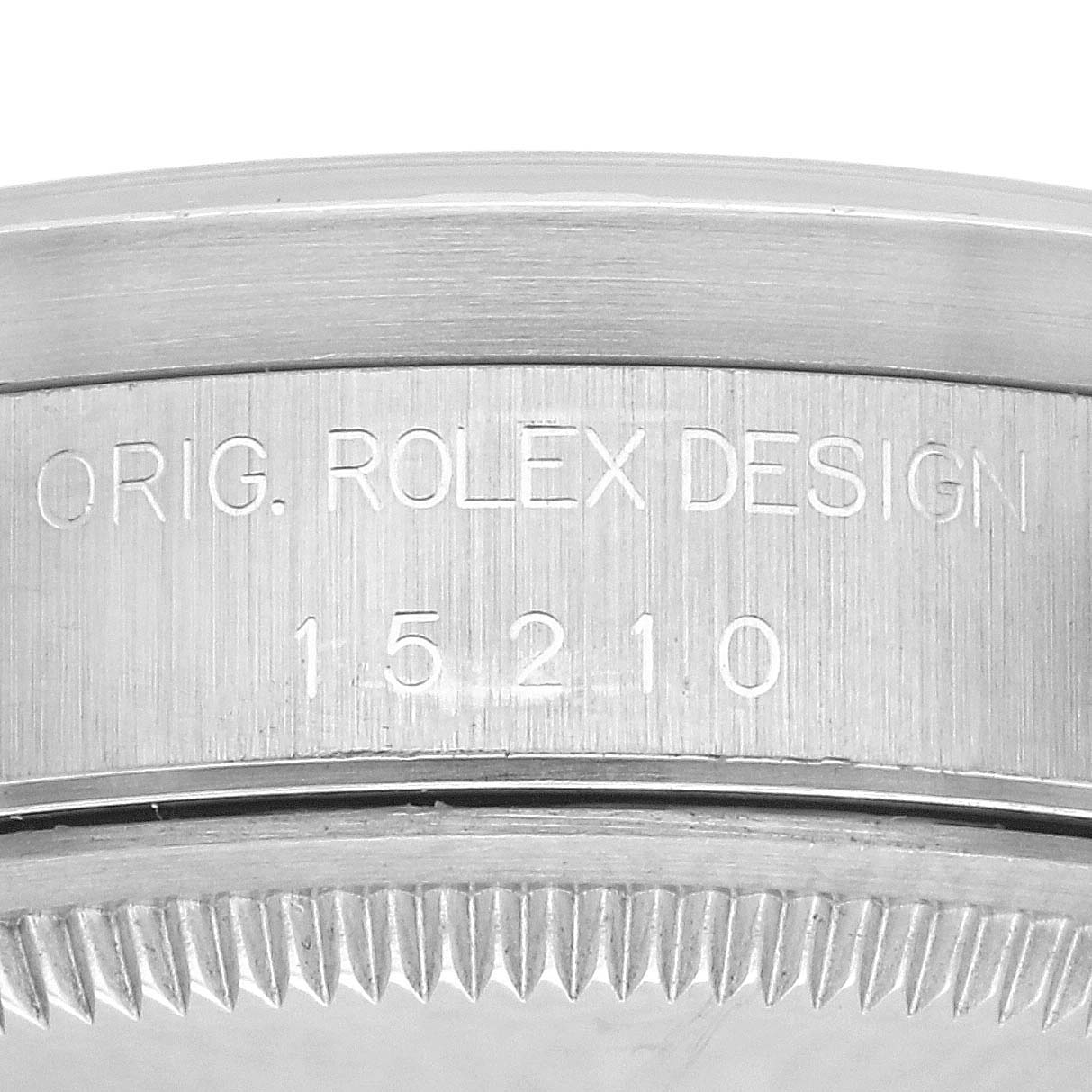 The image shows the side view of a Rolex Date 15210 Men's Stainless Steel White Dial 15210 Men's Stainless Steel White Dial model with visible engravings on the case.