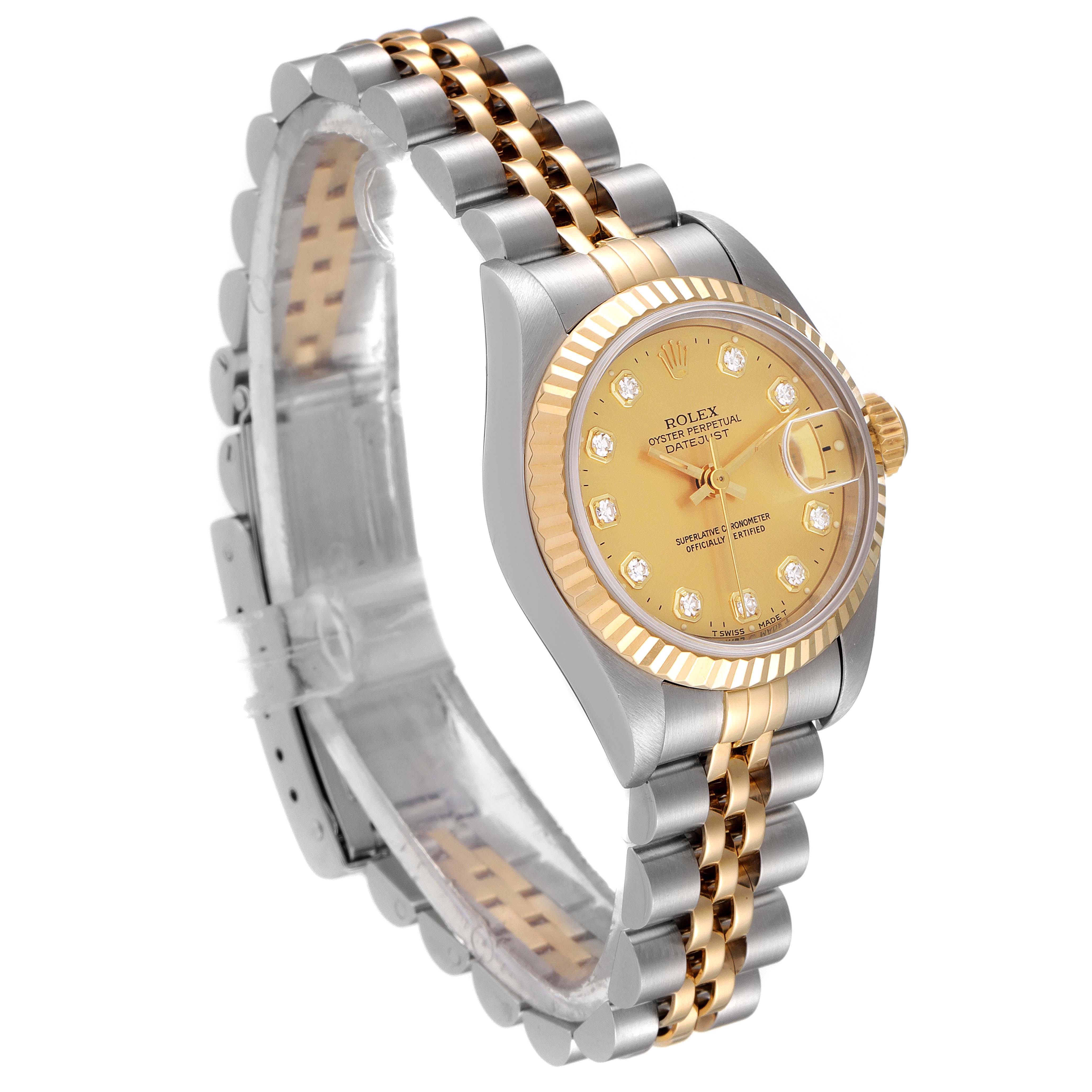 The Rolex Datejust 69173 Women
s Steel and Gold (two tone) Champagne Dial 69173 Women
s Steel and Gold (two tone) Champagne Dial watch is shown at a three-quarter angle, highlighting its gold and silver case, dial, and two-tone bracelet.