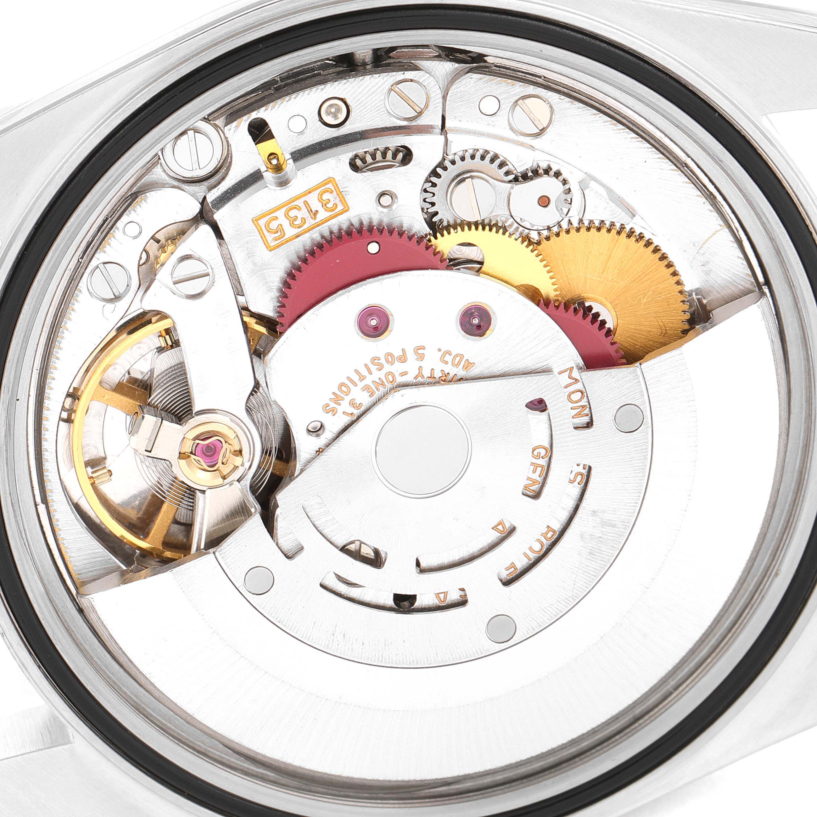 This is an internal view of the Rolex Datejust 16234 Men's Stainless Steel Silver Dial 16234 Men's Stainless Steel Silver Dial watch, highlighting its intricate automatic movement mechanism.