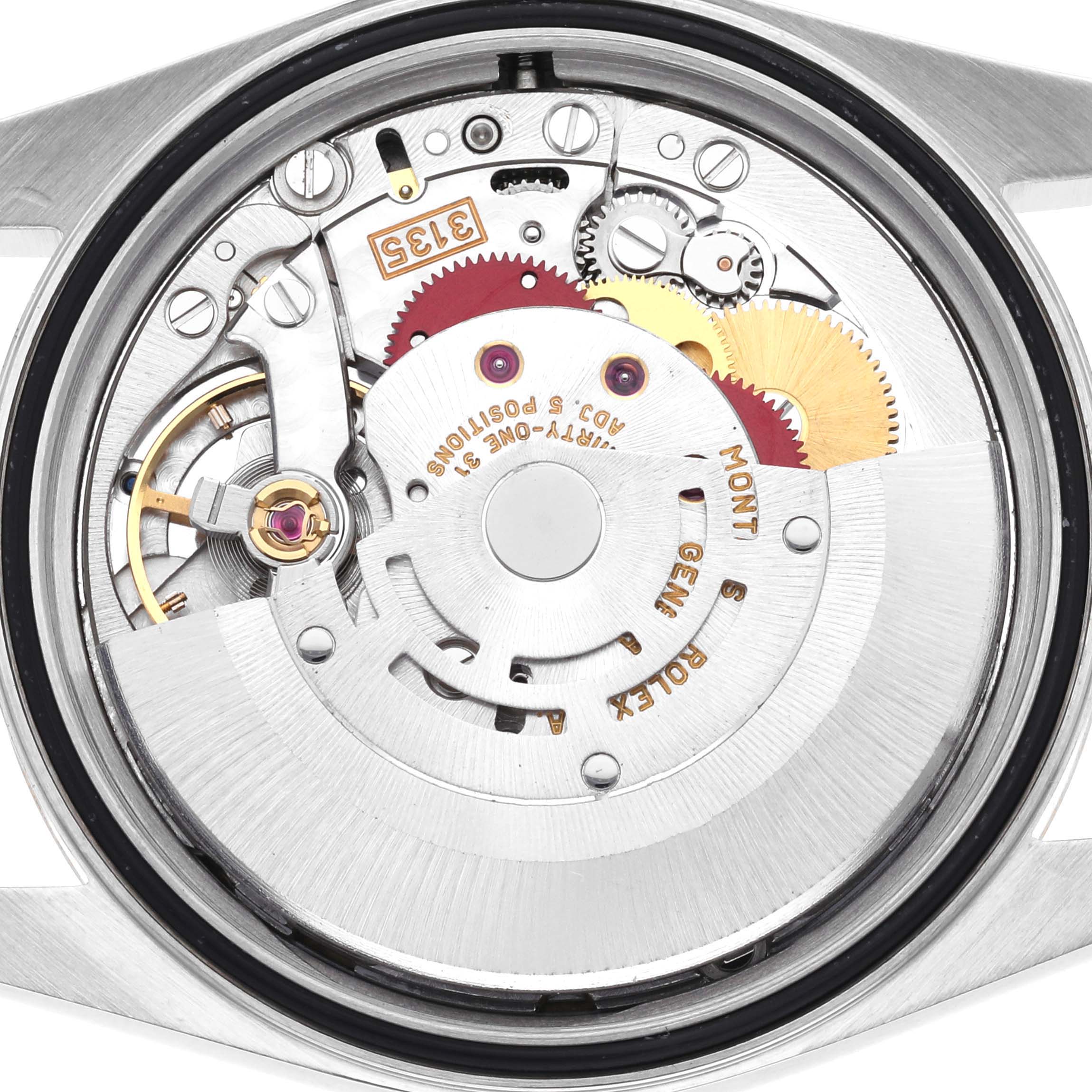 The image shows the inner mechanical movement of a Rolex Datejust 16233 Men's Steel and Gold (two tone) Champagne Dial 16233 Men's Steel and Gold (two tone) Champagne Dial from the back.