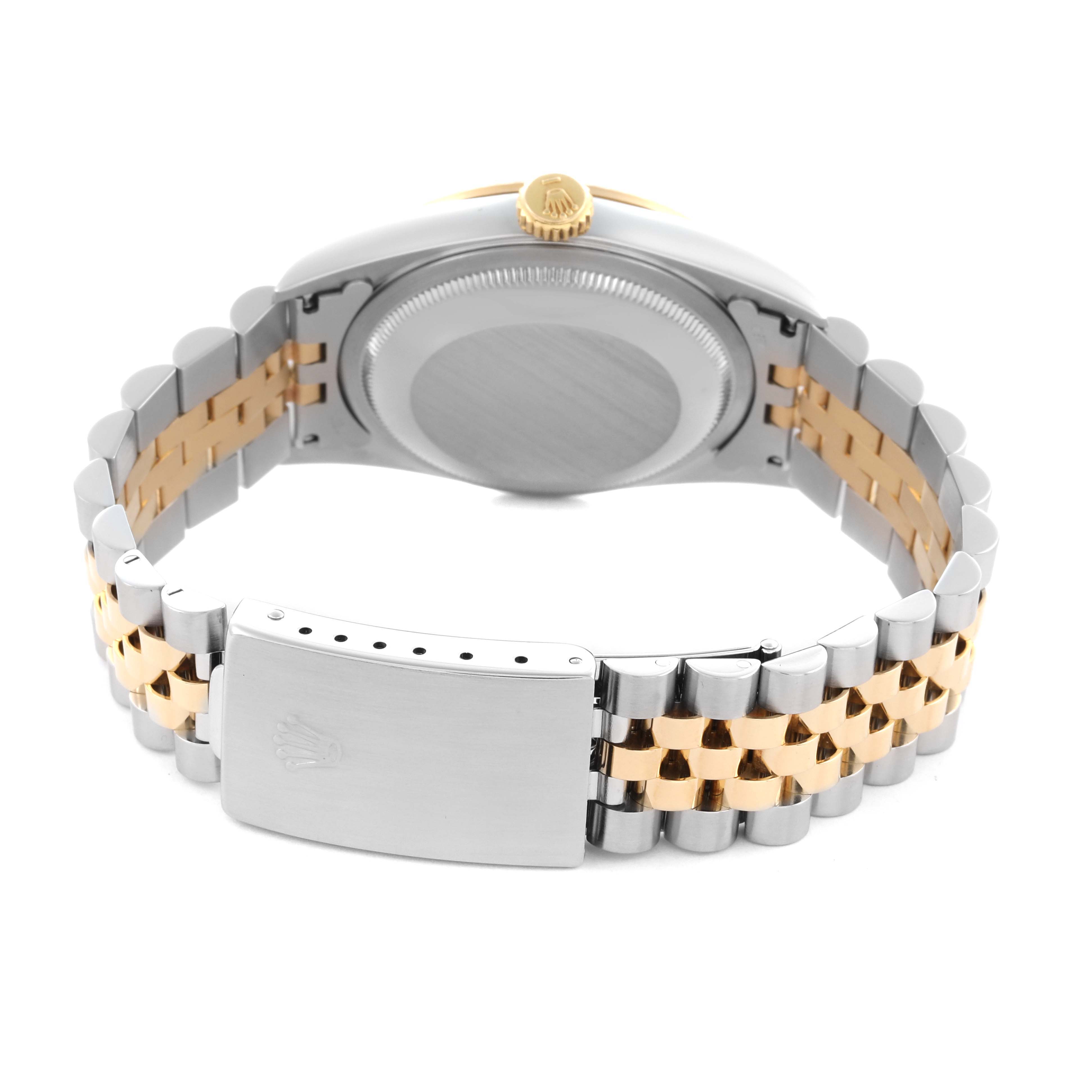 The image shows the back of a Rolex Datejust 16233 Men's Steel and Gold (two tone) Champagne Dial 16233 Men's Steel and Gold (two tone) Champagne Dial watch, highlighting the bracelet and clasp.