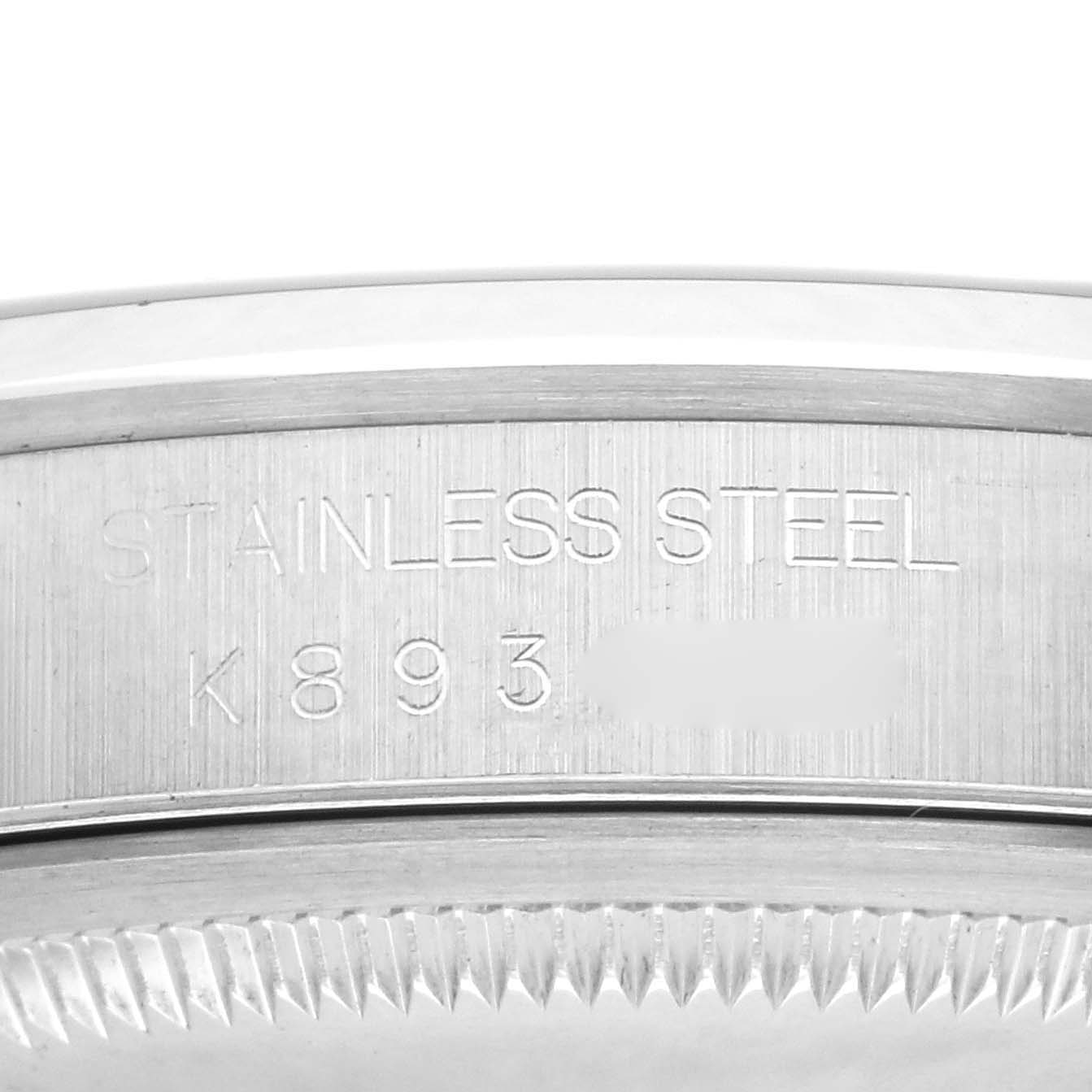 The image shows the side view of the bezel and case back of a Rolex Datejust 16200 Men
s Stainless Steel Blue Dial 16200 Men
s Stainless Steel Blue Dial, highlighting the stainless steel material.