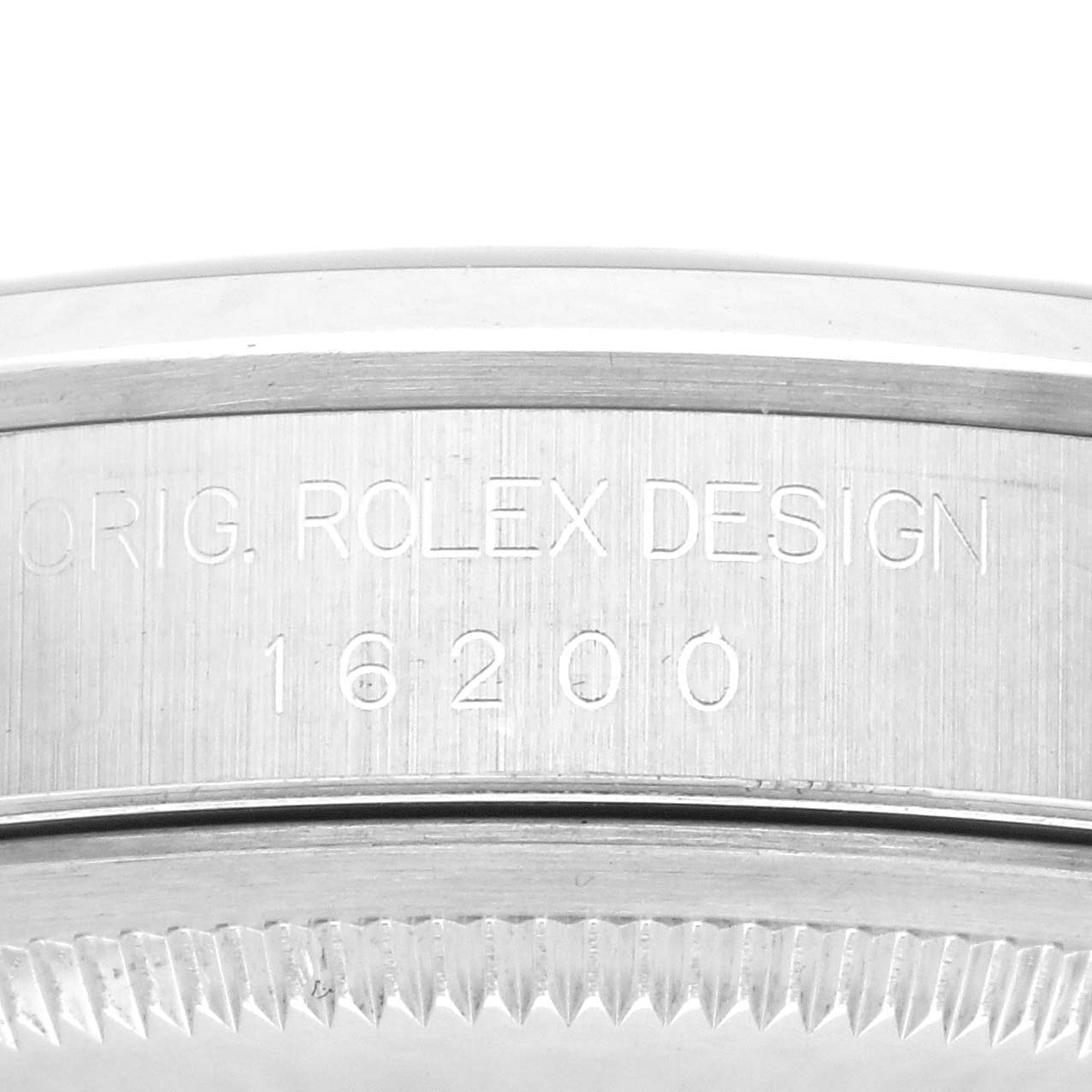 The image shows the side engraving and bezel of a Rolex Datejust 16200 Men
s Stainless Steel Blue Dial 16200 Men
s Stainless Steel Blue Dial model.