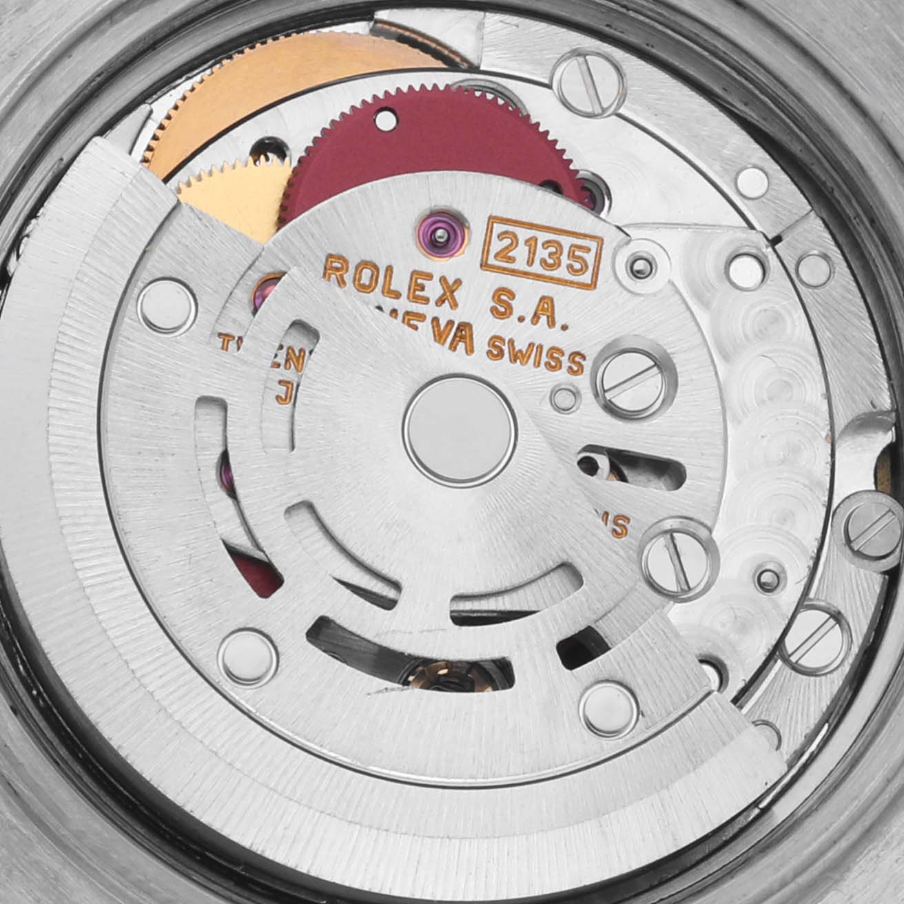 The image shows an angled close-up of the movement inside a Rolex Datejust 69173 Women's Steel and Gold (two tone) Blue Dial 69173 Women's Steel and Gold (two tone) Blue Dial watch, highlighting the rotor and gears.