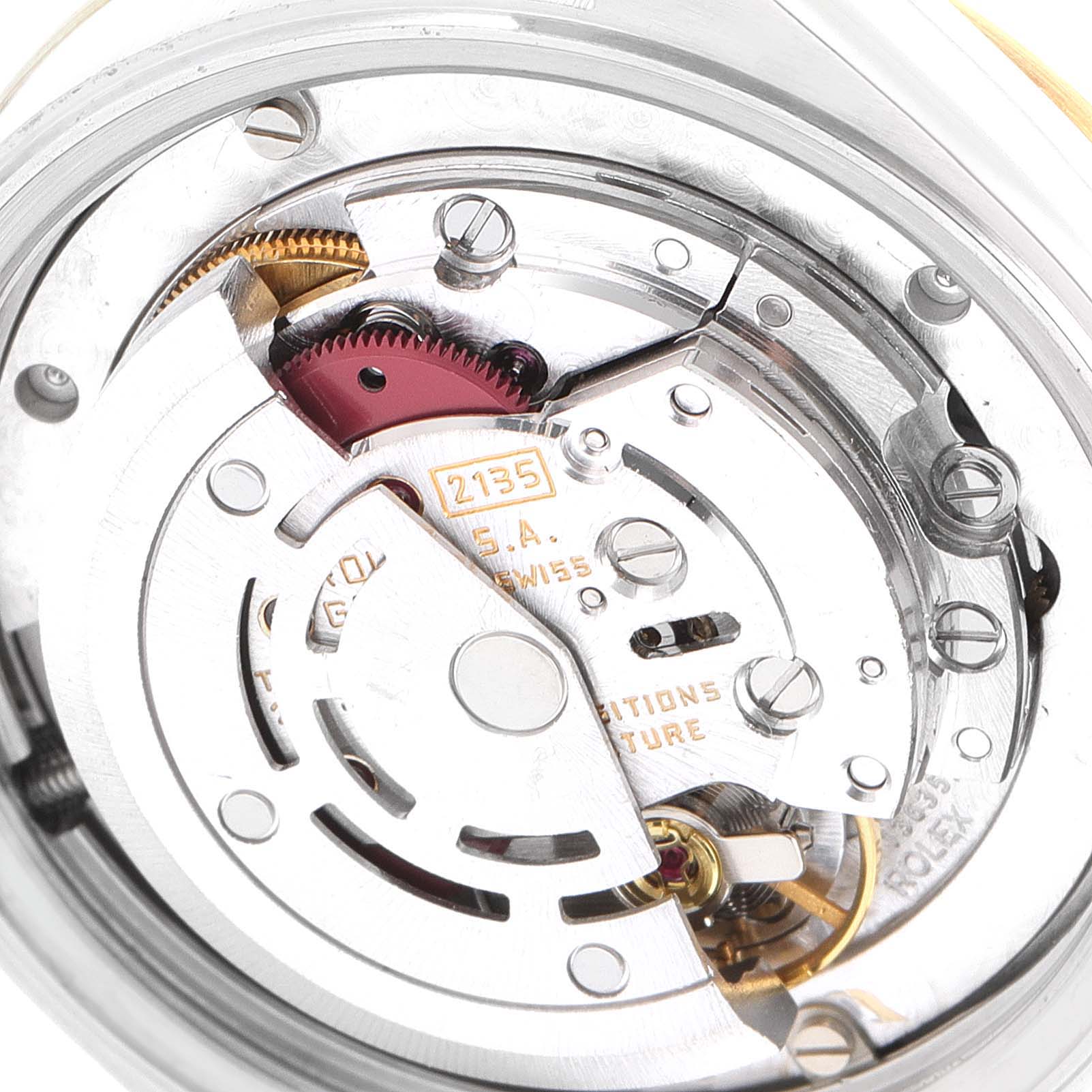 This image shows the internal mechanical movement of the Rolex Mid-Size 68273 Women
s Steel and Gold (two tone) Champagne Dial 68273 Women
s Steel and Gold (two tone) Champagne Dial watch, highlighting gears and components.