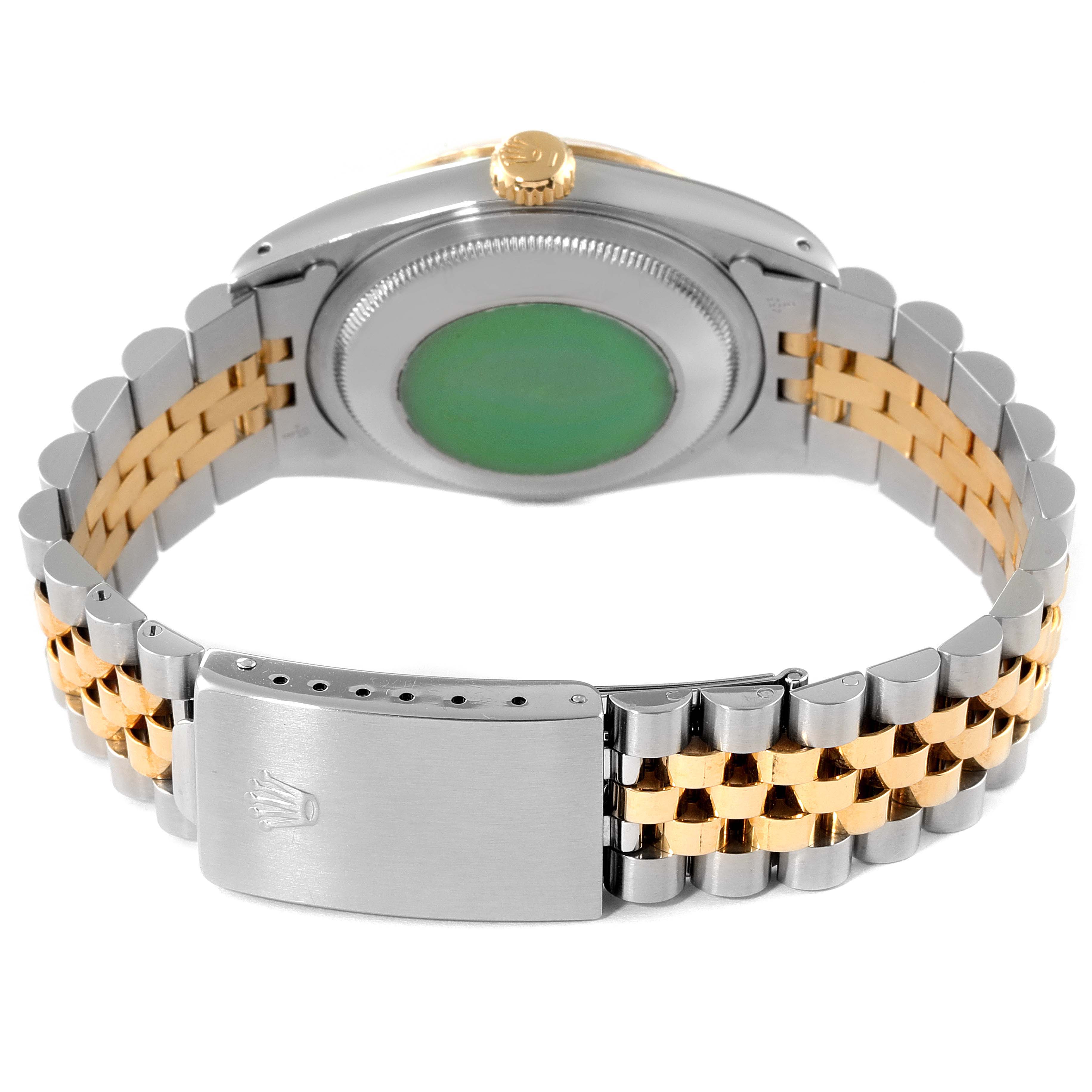 The image shows a Rolex Datejust 16233 Men
s Steel and Gold (two tone) Champagne Dial 16233 Men
s Steel and Gold (two tone) Champagne Dial watch from the back angle, highlighting the case back, crown, and two-tone Jubilee bracelet.