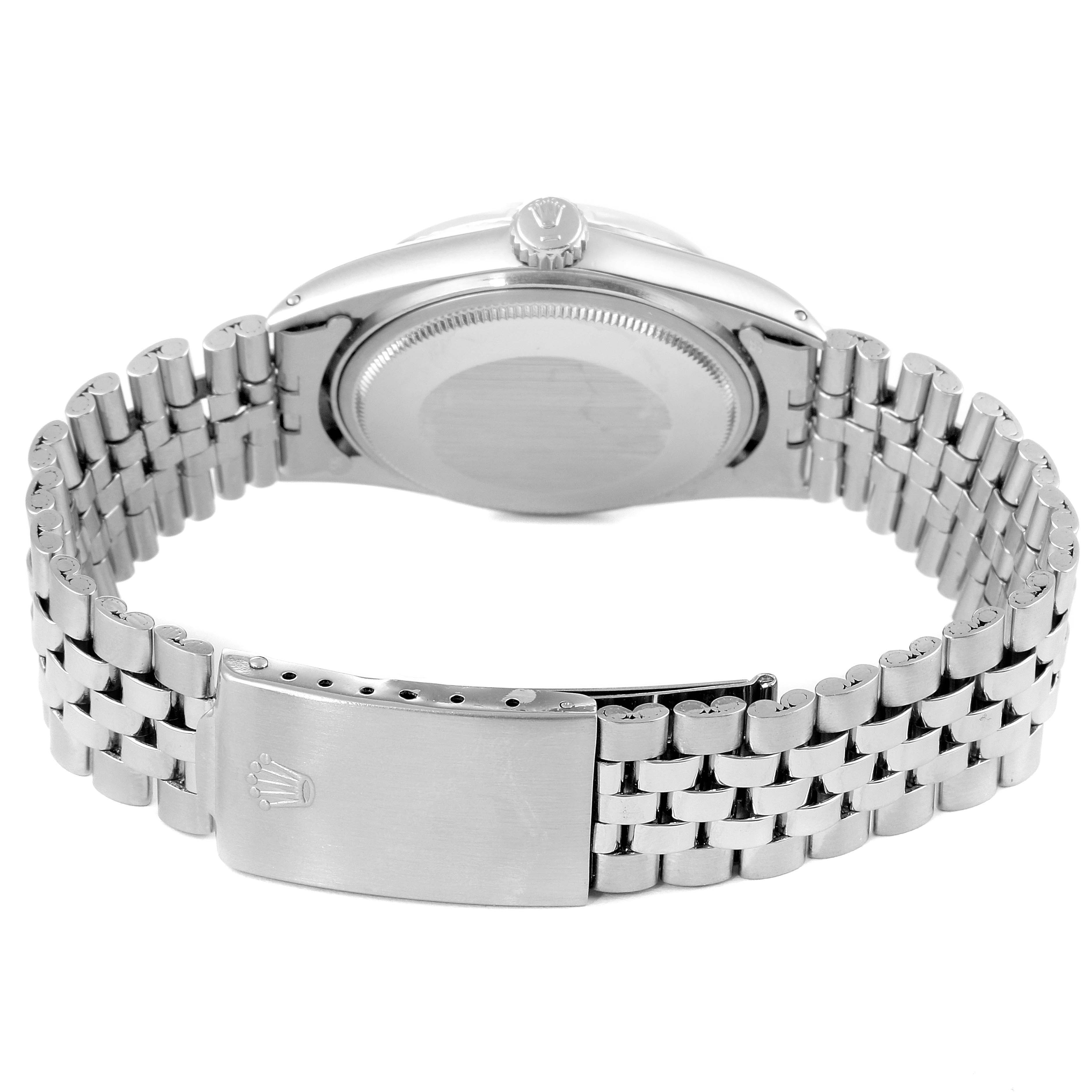 The image shows the back view of a Vintage Collection model Rolex watch, highlighting its clasp, bracelet, and case back.