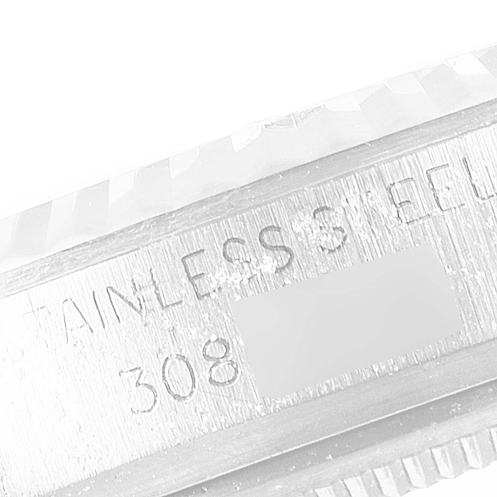 This image shows a close-up of the stainless steel casing and serial number of the Rolex Vintage Collection 1601 Men
s Stainless Steel Silver Dial 1601 Men
s Stainless Steel Silver Dial watch.