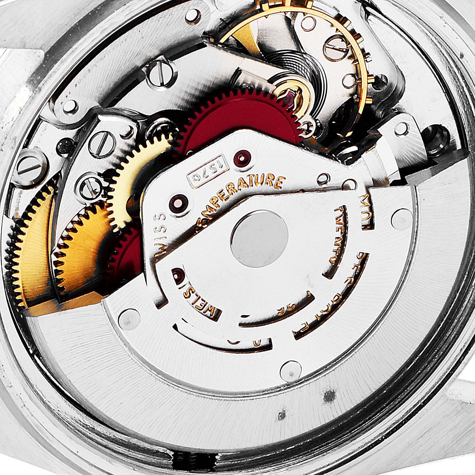 This image shows the intricate internal mechanism of the Rolex Vintage Collection 1601 Men
s Stainless Steel Silver Dial 1601 Men
s Stainless Steel Silver Dial watch, specifically the movement with gears and rotor.
