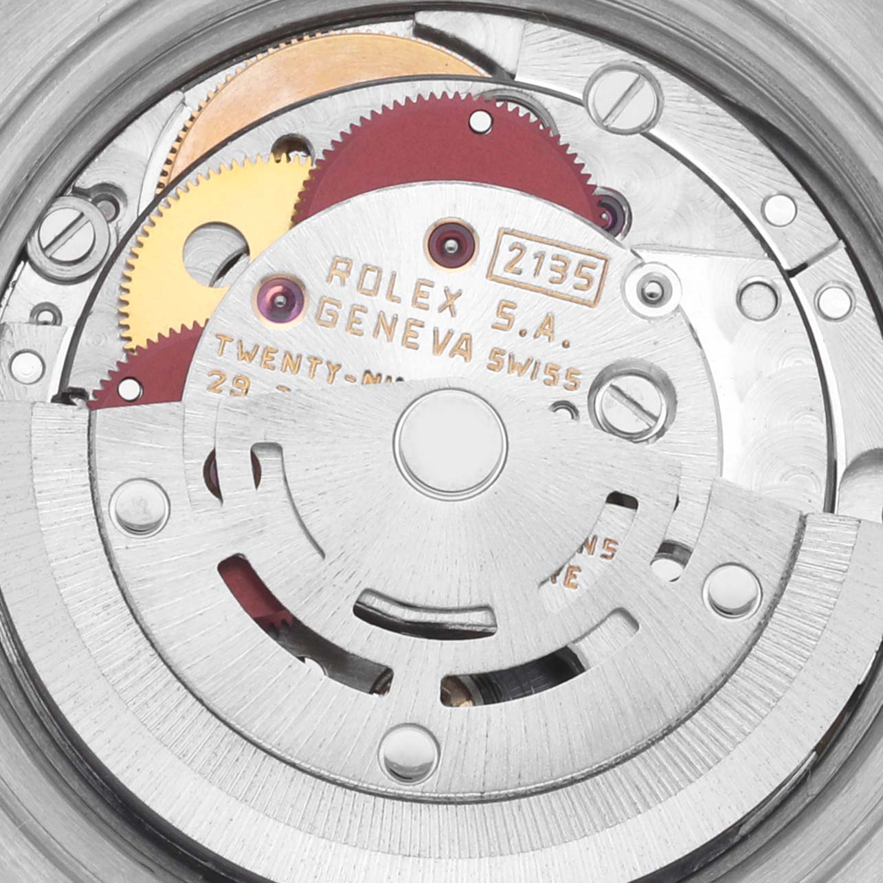 The image shows a close-up of the movement mechanism of the Rolex Datejust 69173 Women's Steel and Gold (two tone) Champagne Dial 69173 Women's Steel and Gold (two tone) Champagne Dial watch, highlighting the gears and rotor.