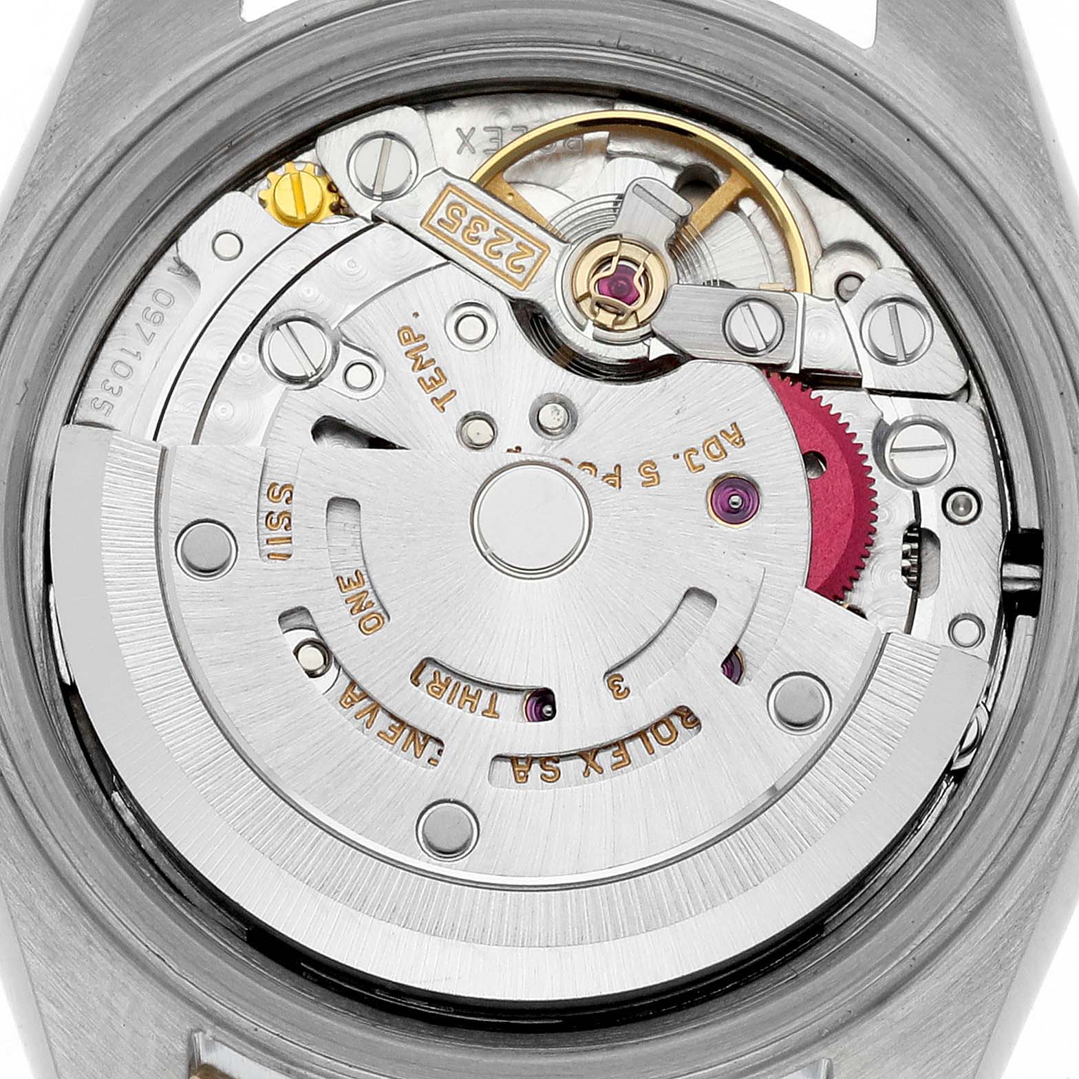 The image shows the movement of the Rolex Datejust 79173 Women's Steel and Gold (two tone) White Dial 79173 Women's Steel and Gold (two tone) White Dial watch from a back angle, highlighting gears and rotor.