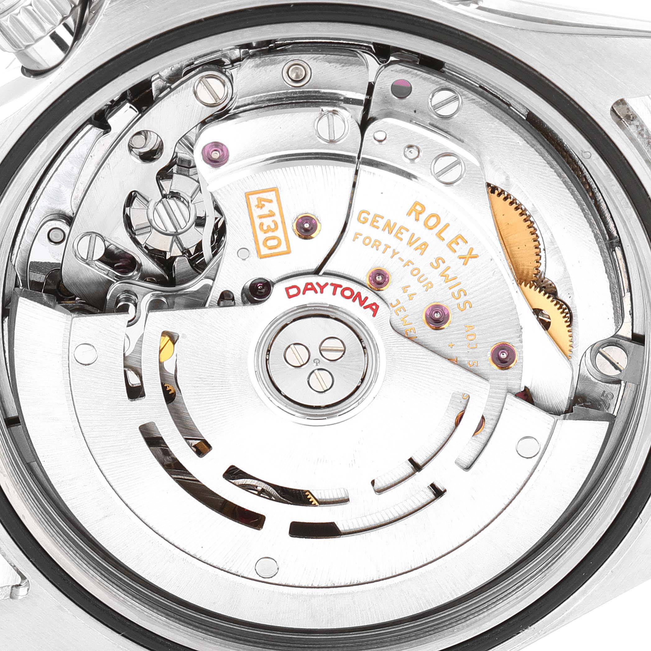 This image shows a close-up view of the movement of a Rolex Daytona 116520 Men's Stainless Steel Black Dial 116520 Men's Stainless Steel Black Dial watch, focusing on its intricate internal mechanisms.