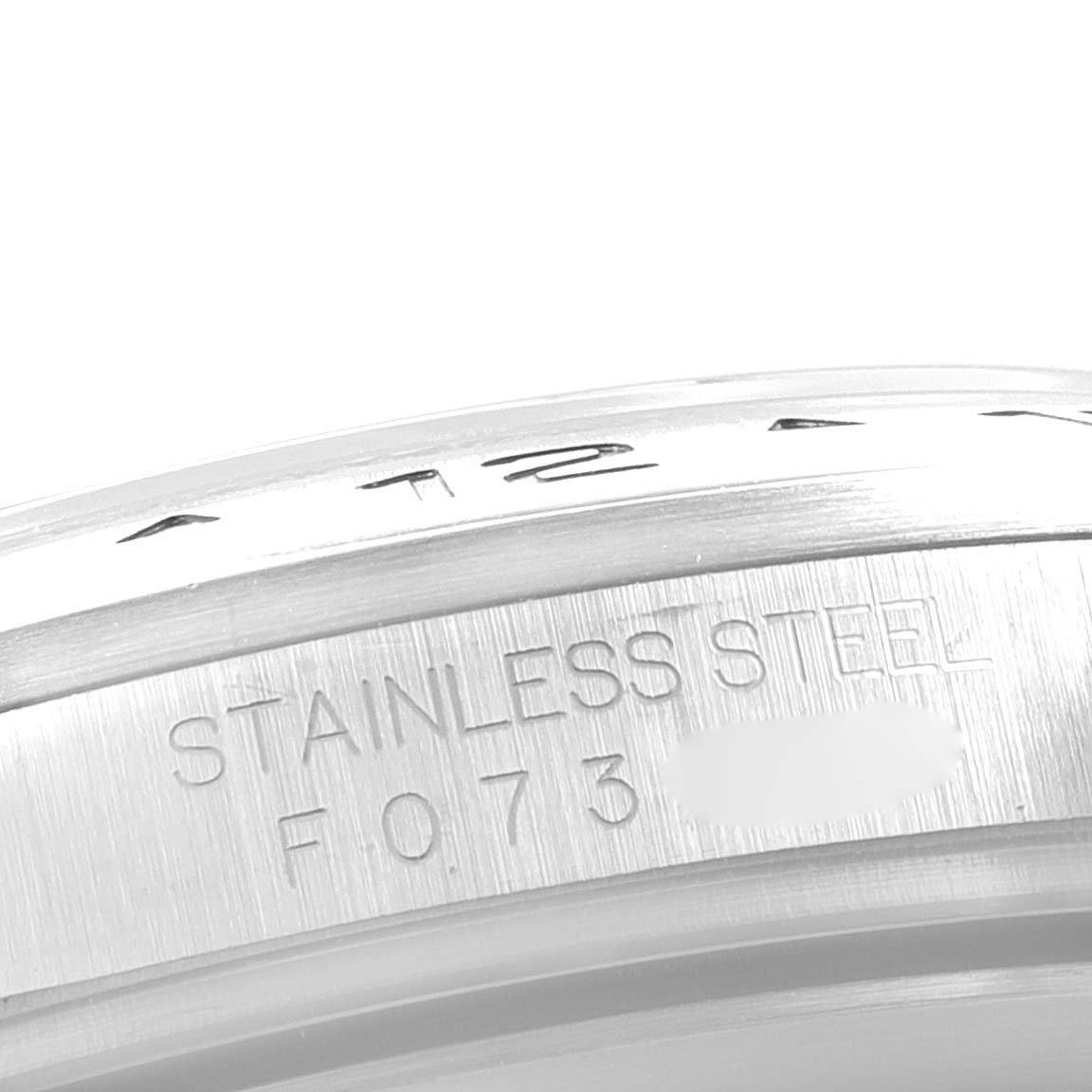 This image shows a close-up view of the stainless steel caseback and serial number of a Rolex Explorer 16570 Men
s Stainless Steel White Dial 16570 Men
s Stainless Steel White Dial watch.